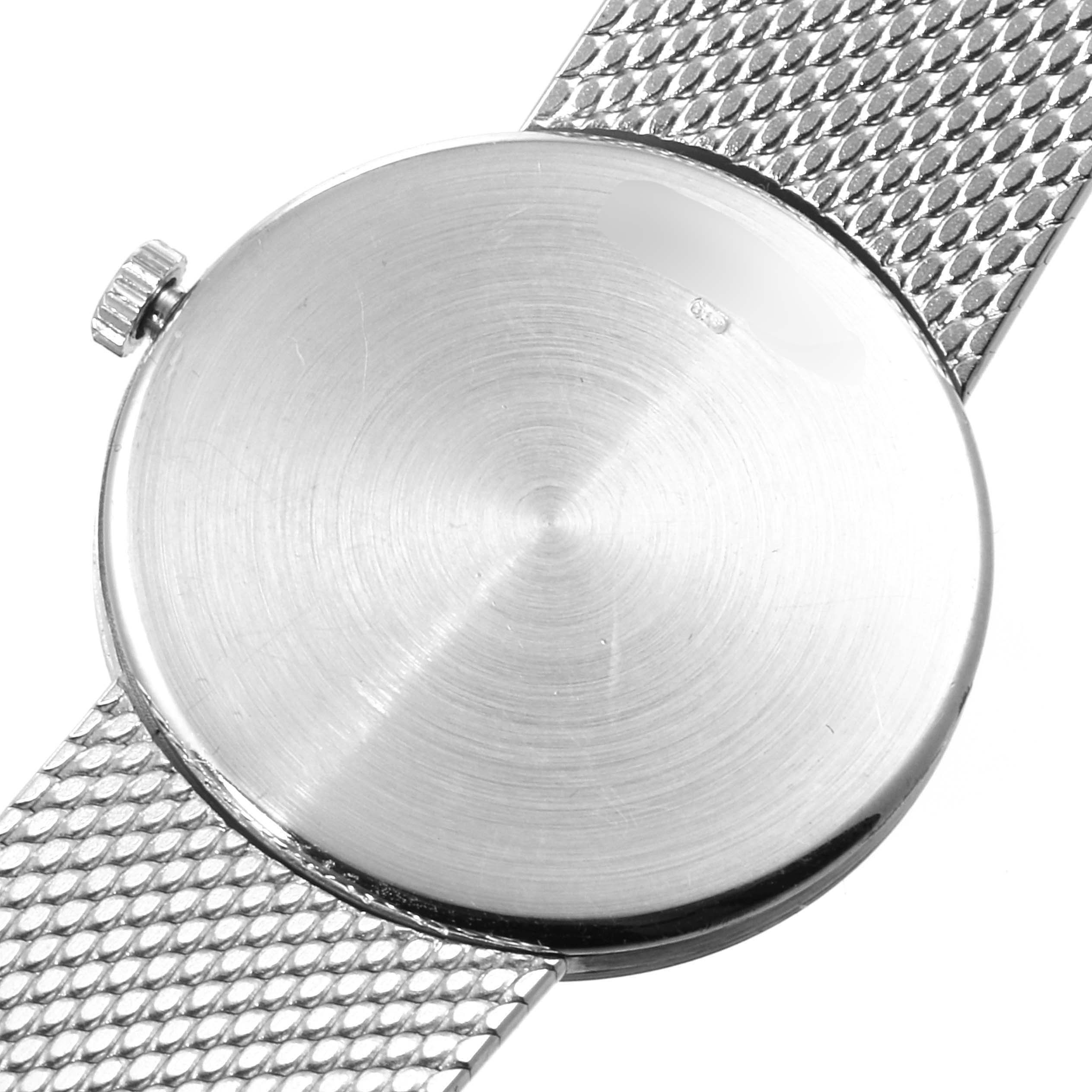 The image shows the backside and the metal mesh strap of a Vintage Audemars Piguet watch.