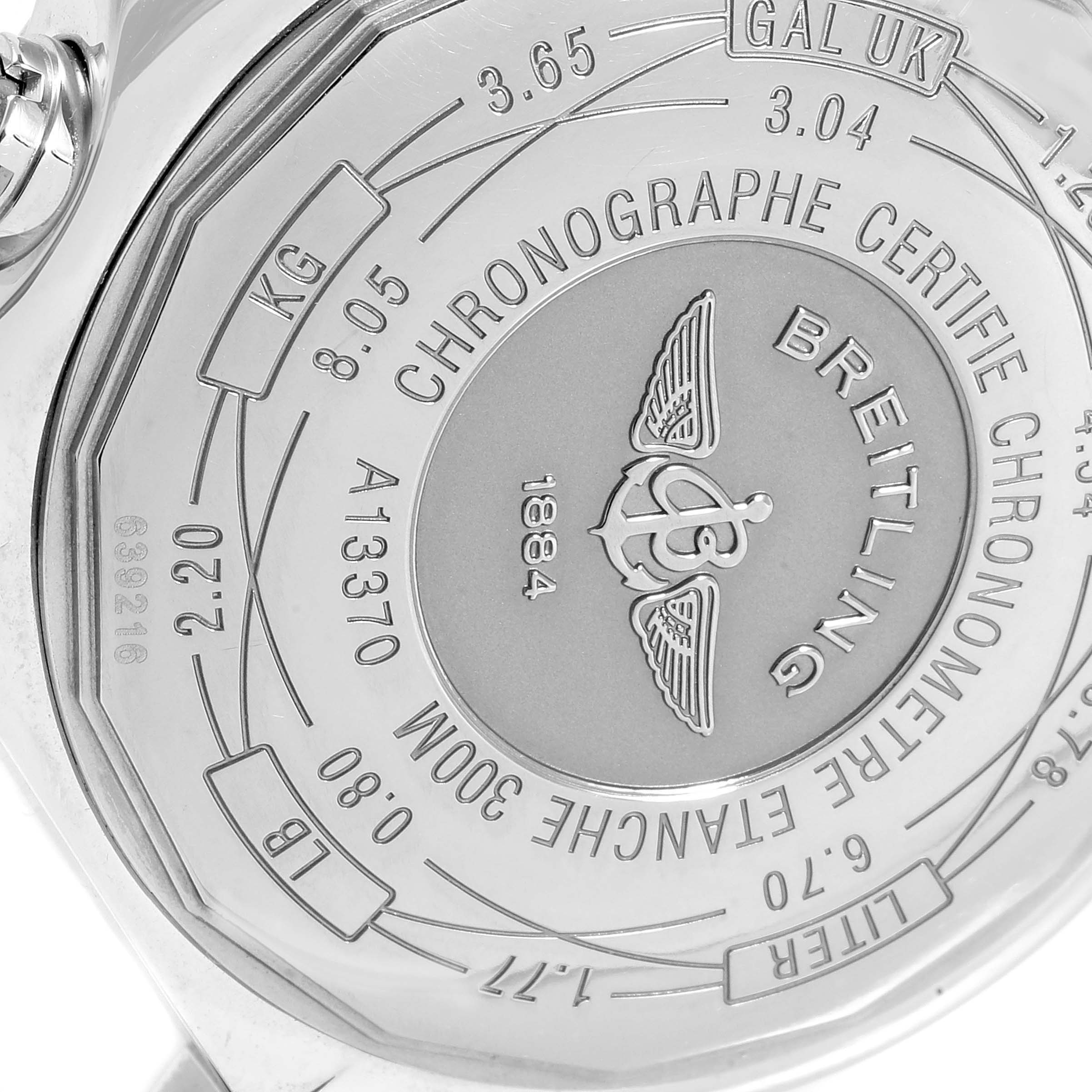 The image shows the back side of a Breitling Avenger A13370 Men
s Stainless Steel Blue Dial A13370 Men
s Stainless Steel Blue Dial watch with detailed engravings and specifications.