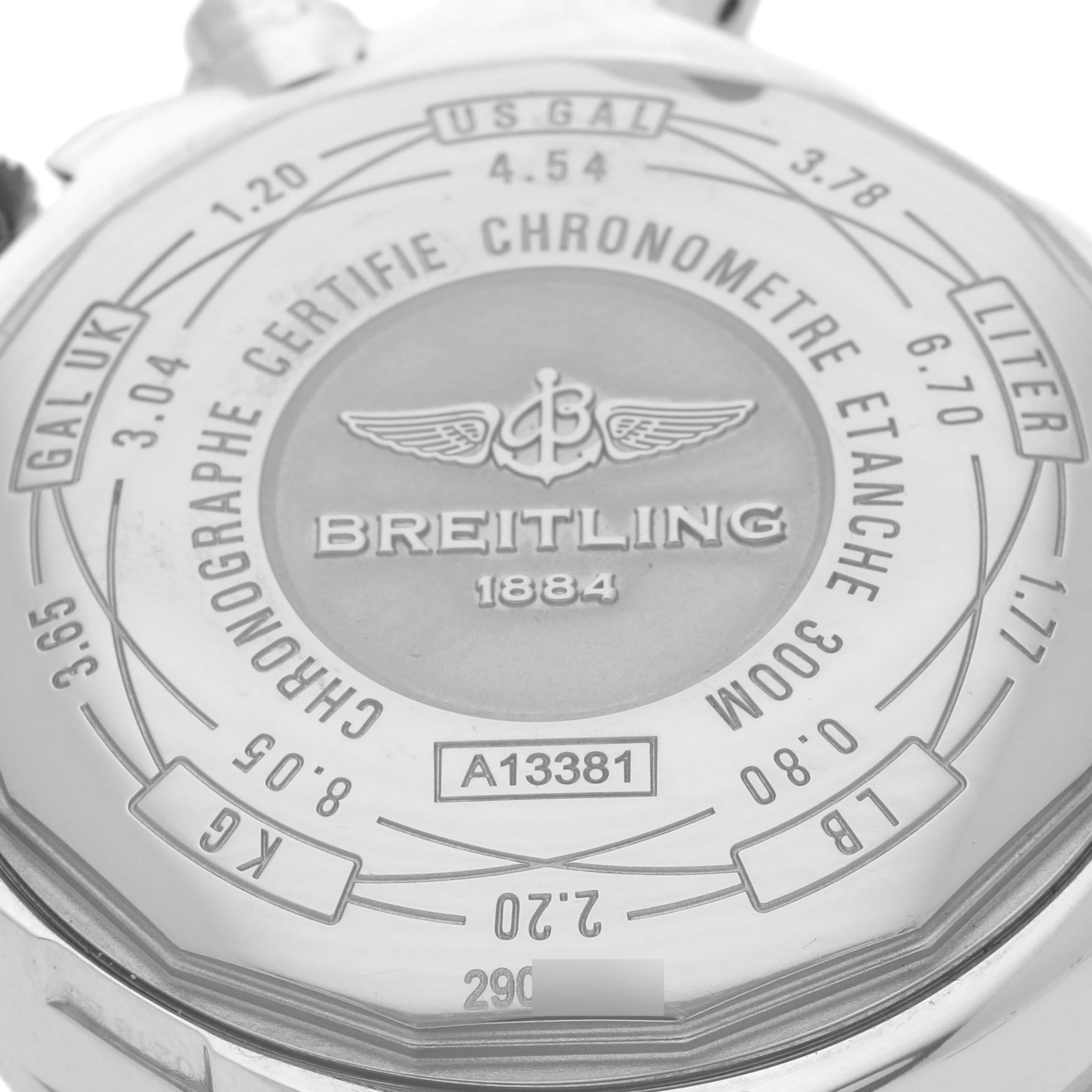 The image shows the back of a Breitling Avenger A1338111/BC33 Men's Stainless Steel Black Dial A1338111/BC33 Men's Stainless Steel Black Dial watch, highlighting markings like the brand name and various measurement conversions.