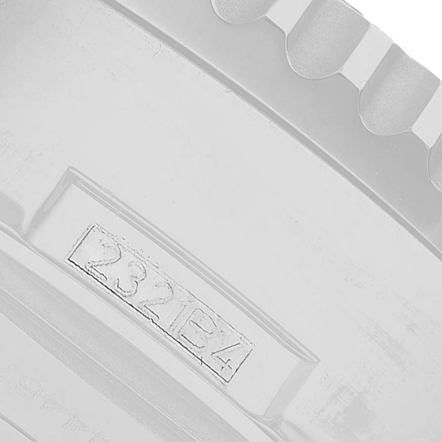 The image shows a close-up of the casing with visible serial numbers on the Breitling Navitimer AB0127211C2A1 Men's Stainless Steel Blue Dial.