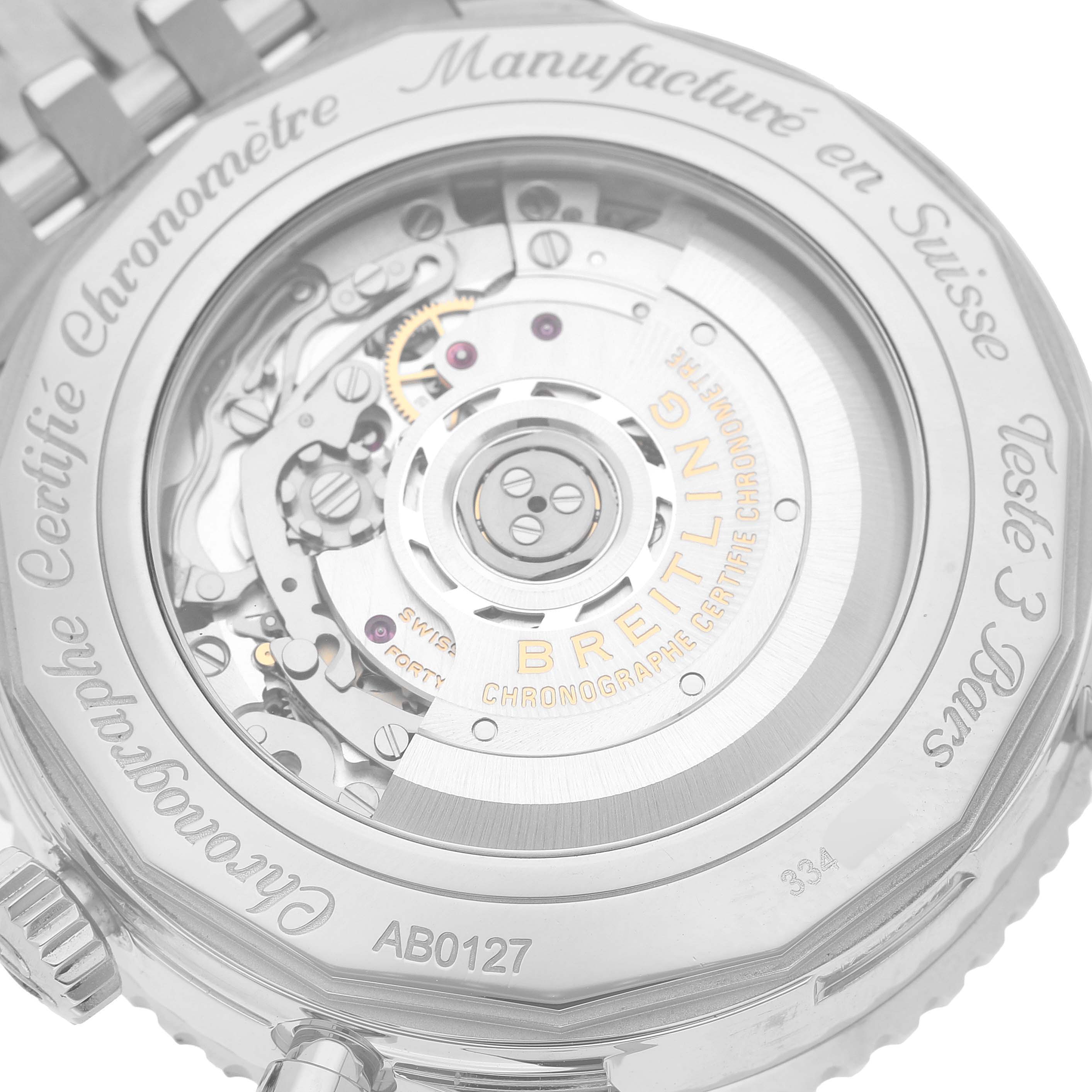 The image shows the open case back of a Breitling Navitimer AB0127211C2A1 Men's Stainless Steel Blue Dial, displaying the intricate movement and components inside.