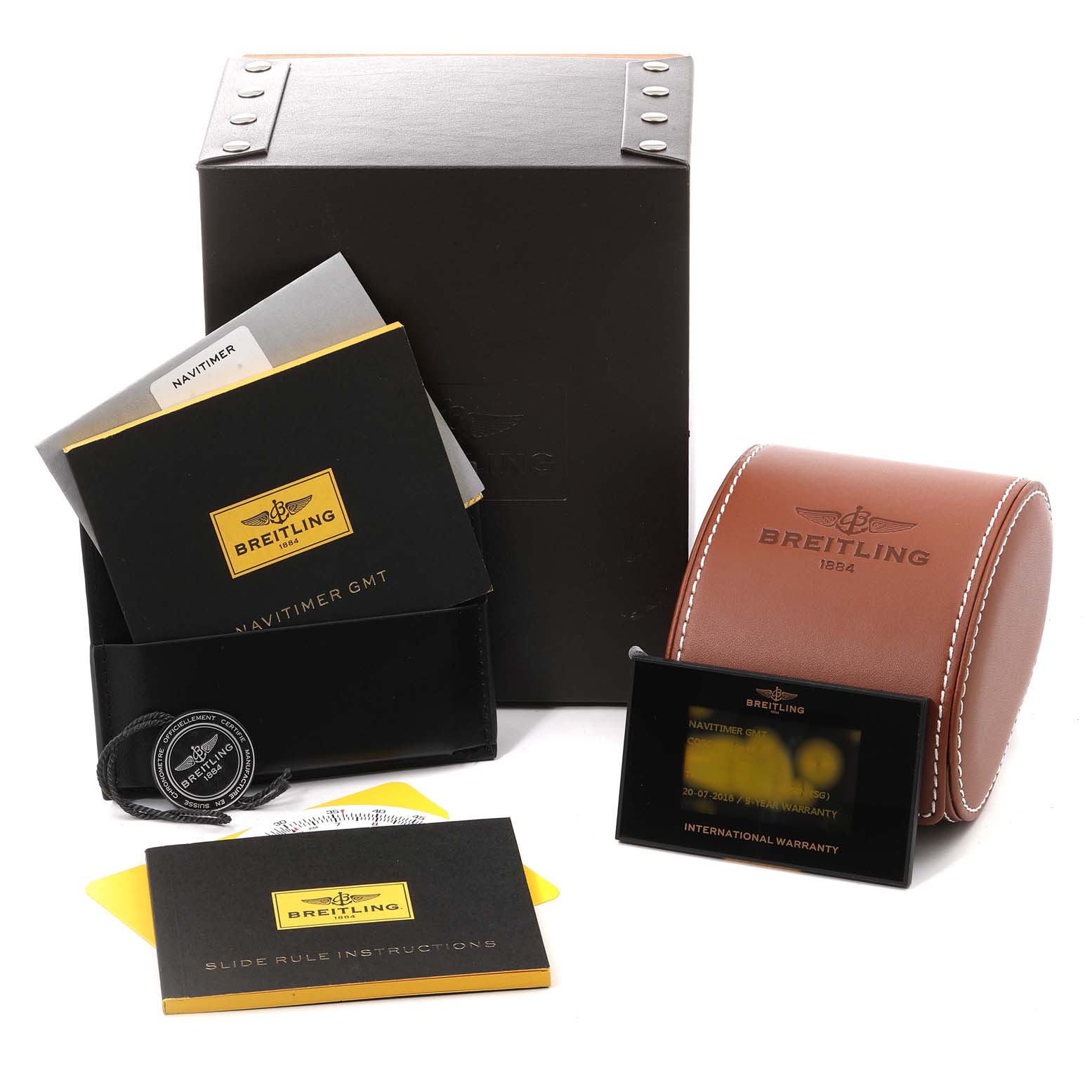 The image shows Breitling Navitimer AB044121-G783-453A Men's Stainless Steel Silver Dial AB044121-G783-453A Men's Stainless Steel Silver Dial watch accessories, including booklets, a warranty card, a case, and a box, viewed from the front.