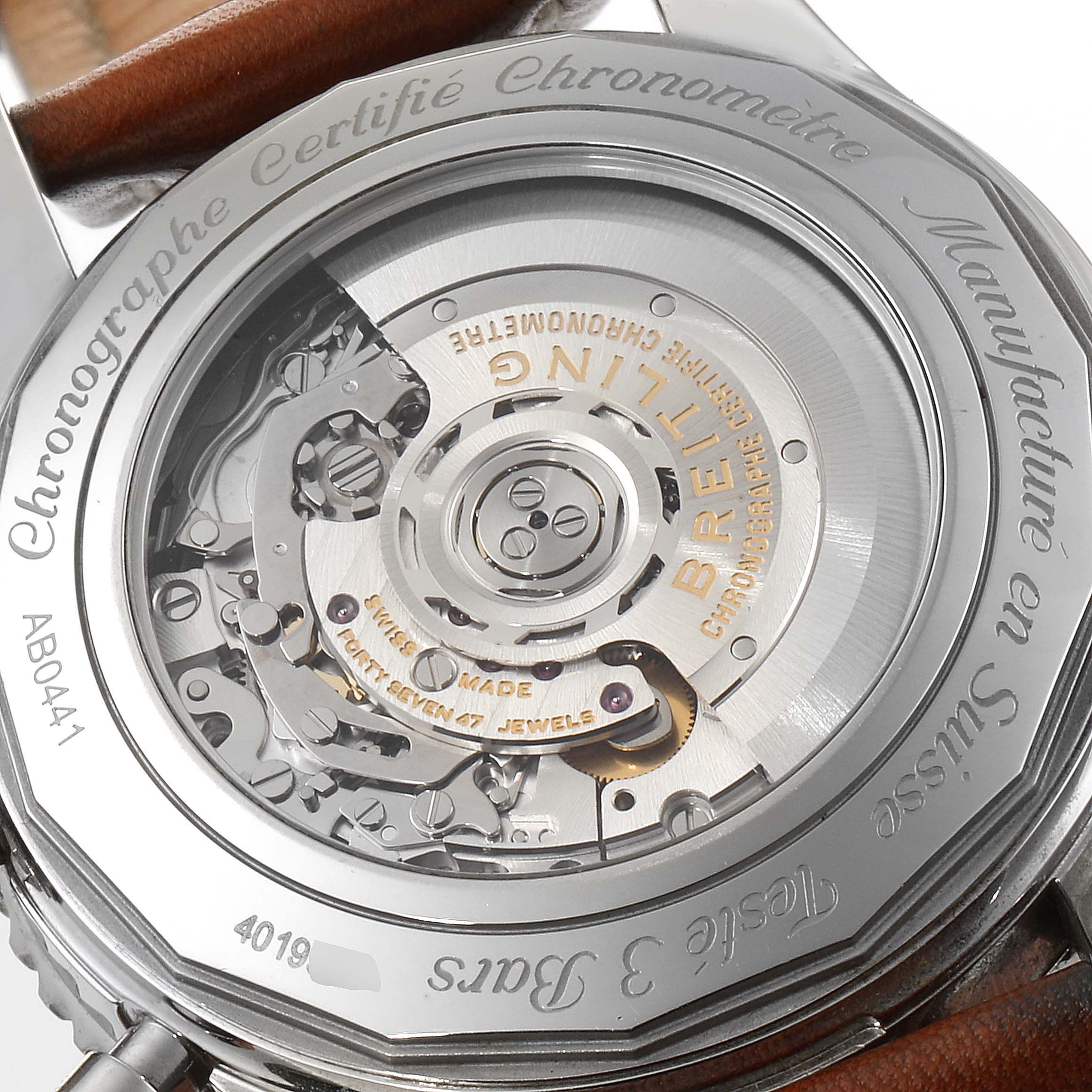 This is the back view of a Breitling Navitimer AB044121-G783-453A Men's Stainless Steel Silver Dial AB044121-G783-453A Men's Stainless Steel Silver Dial watch, showing the exposed automatic movement.