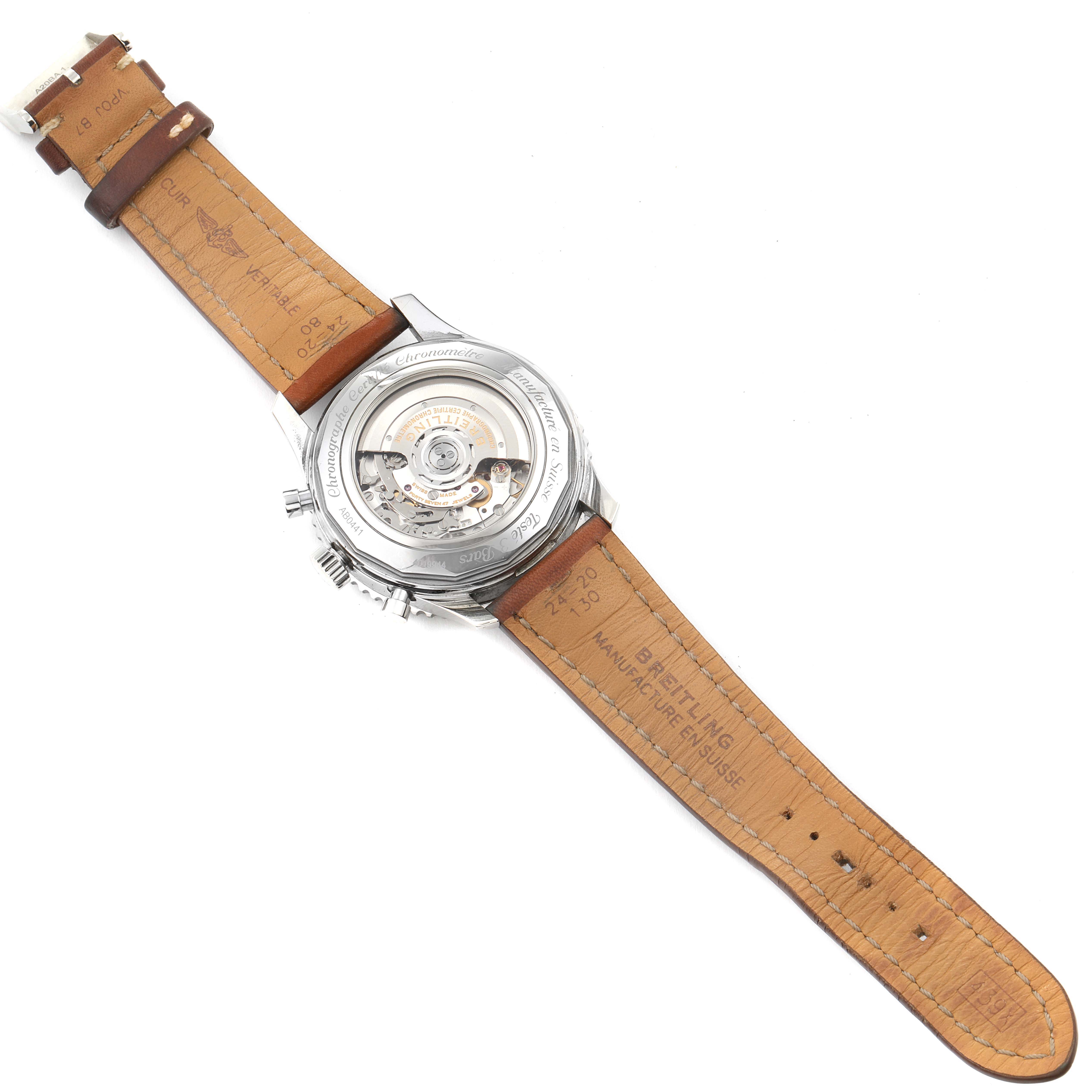 This image shows the Breitling Navitimer AB044121-G783-453A Men's Stainless Steel Silver Dial AB044121-G783-453A Men's Stainless Steel Silver Dial watch from the back, displaying the leather strap and the transparent case back revealing the movement.