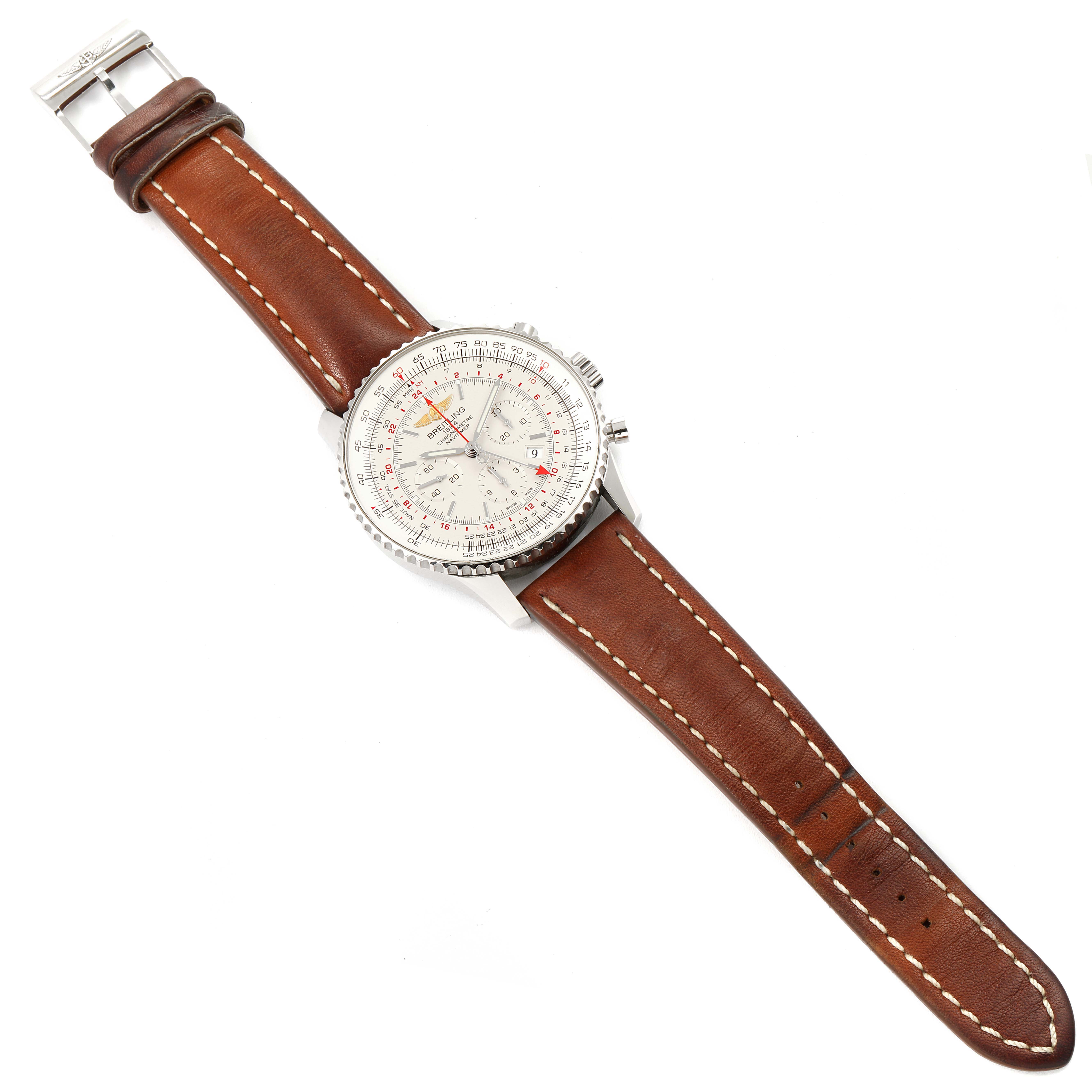 The Breitling Navitimer AB044121-G783-453A Men's Stainless Steel Silver Dial AB044121-G783-453A Men's Stainless Steel Silver Dial watch is shown from a top-down angle, displaying its dial, bezel, case, and brown leather strap with white stitching.