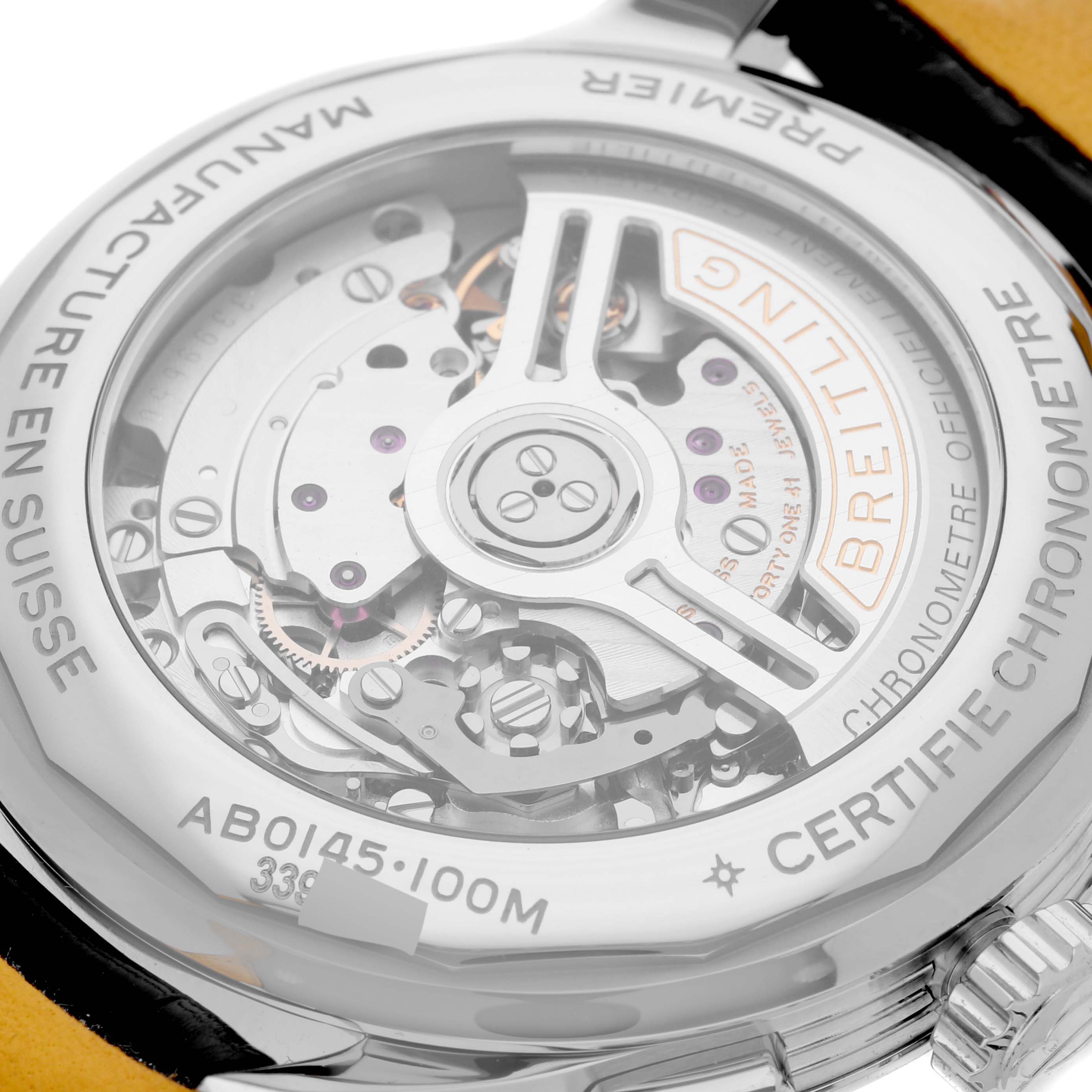 The image shows the back view of a Breitling Premier AB0145331K1P2 Men's Stainless Steel Pink Dial AB0145331K1P2 Men's Stainless Steel Pink Dial model watch, highlighting its intricate movement and internal mechanics.