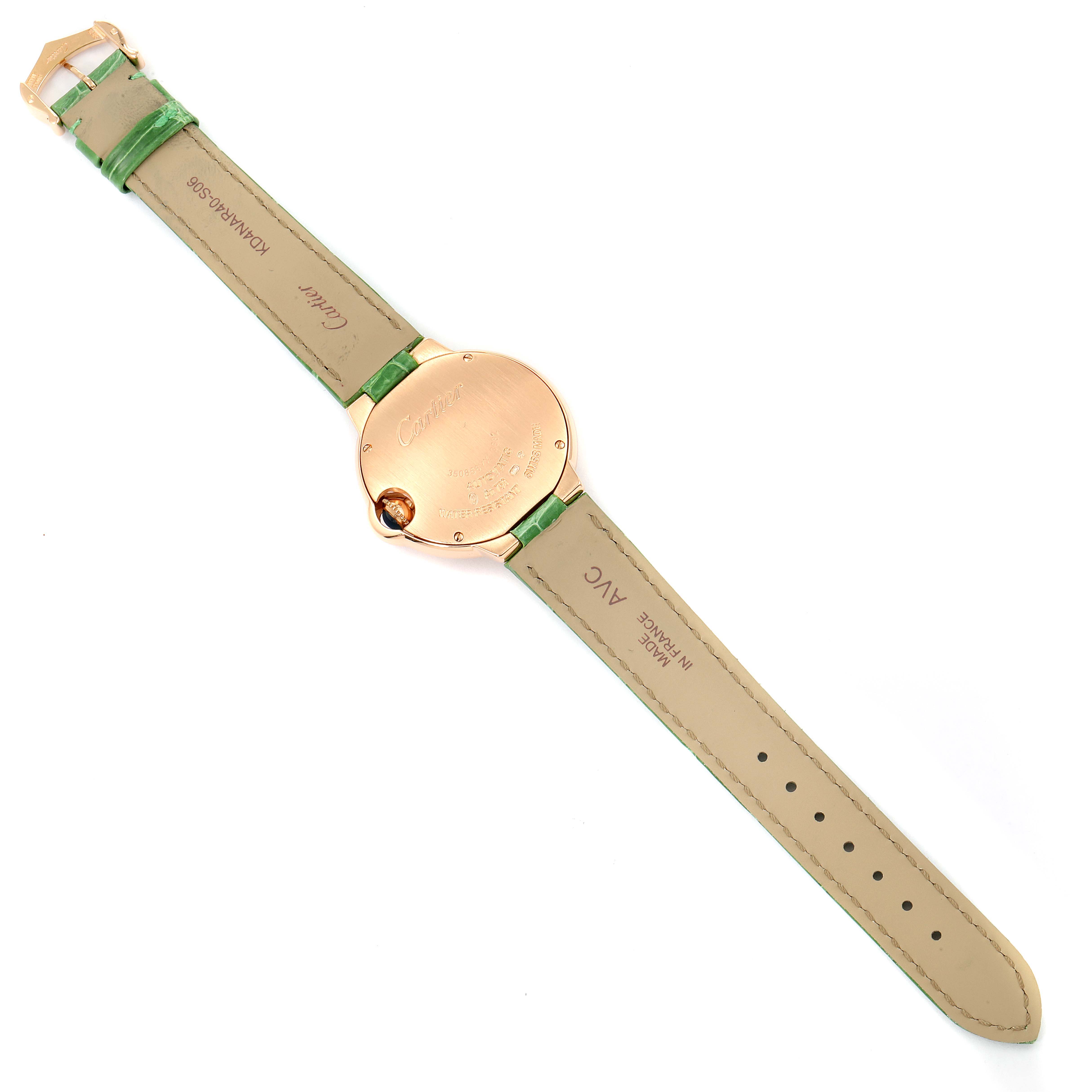 The image shows the back of a Ballon Bleu model by Cartier, focusing on the case back and leather strap.