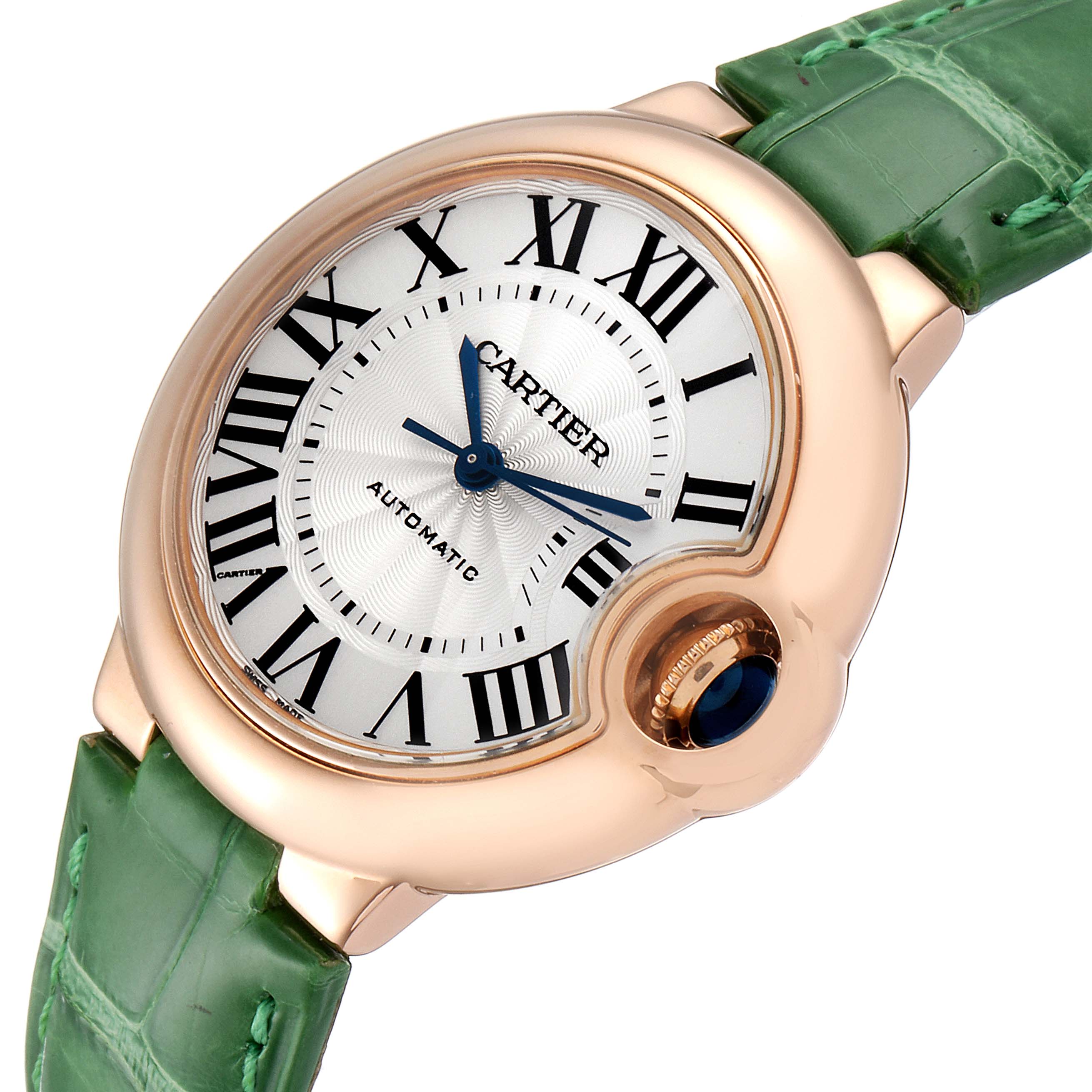 This image shows a Ballon Bleu de Cartier watch at an angle highlighting the face, bezel, and green strap.