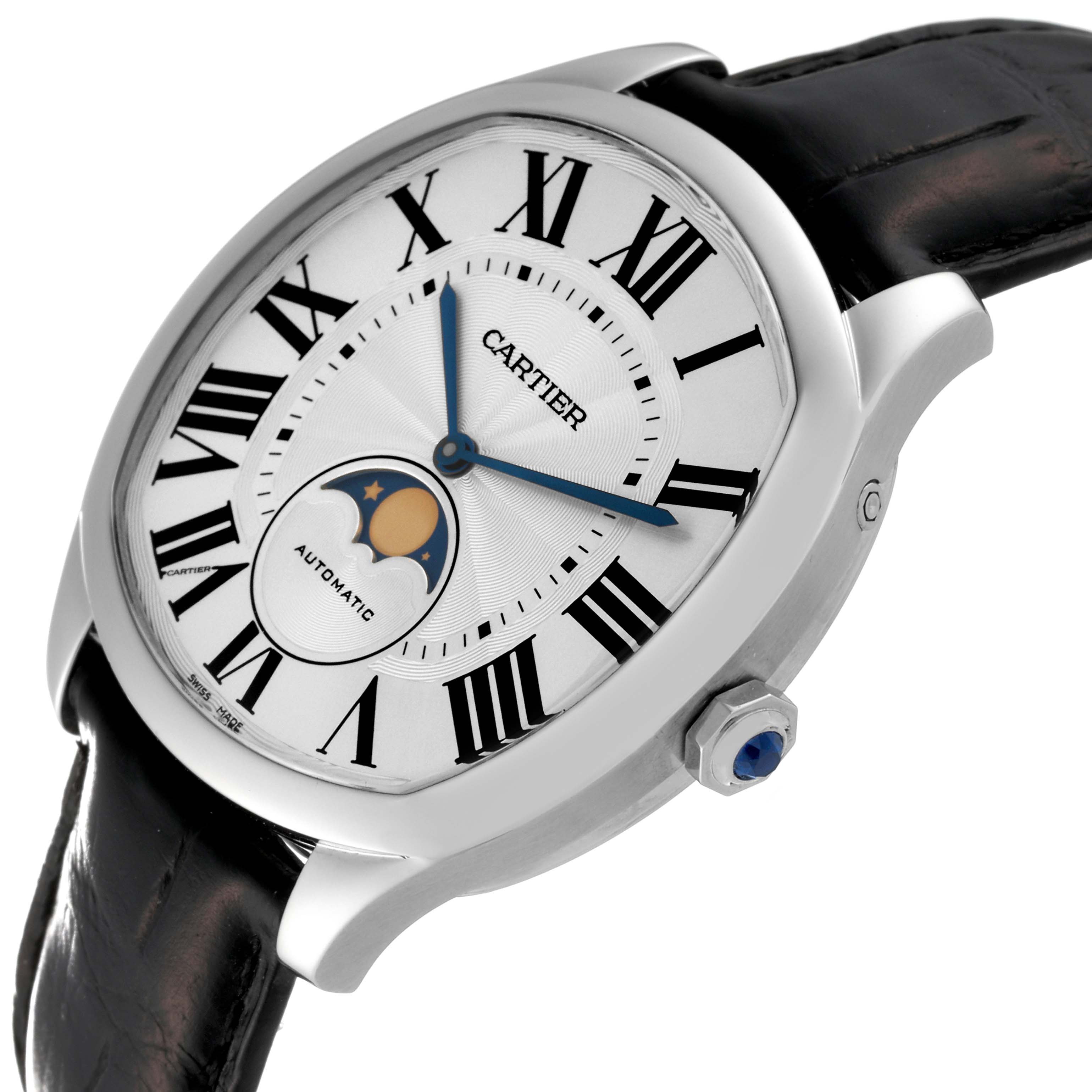 The image shows a Drive de Cartier watch by Cartier at an angled side view, displaying the dial, crown, and part of the strap.