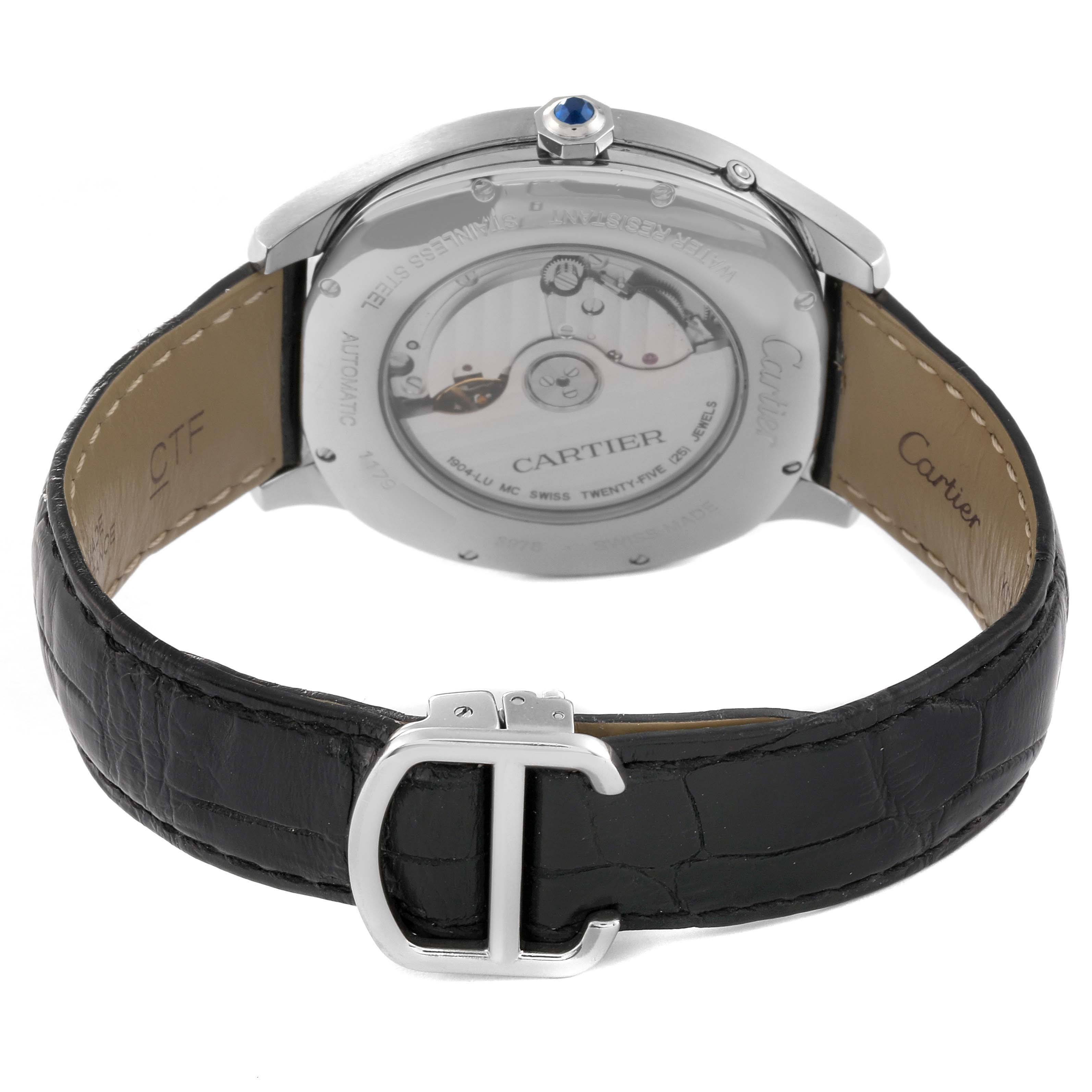 The image shows the back of the Drive de Cartier watch by Cartier, highlighting the movement and the leather strap with clasp.