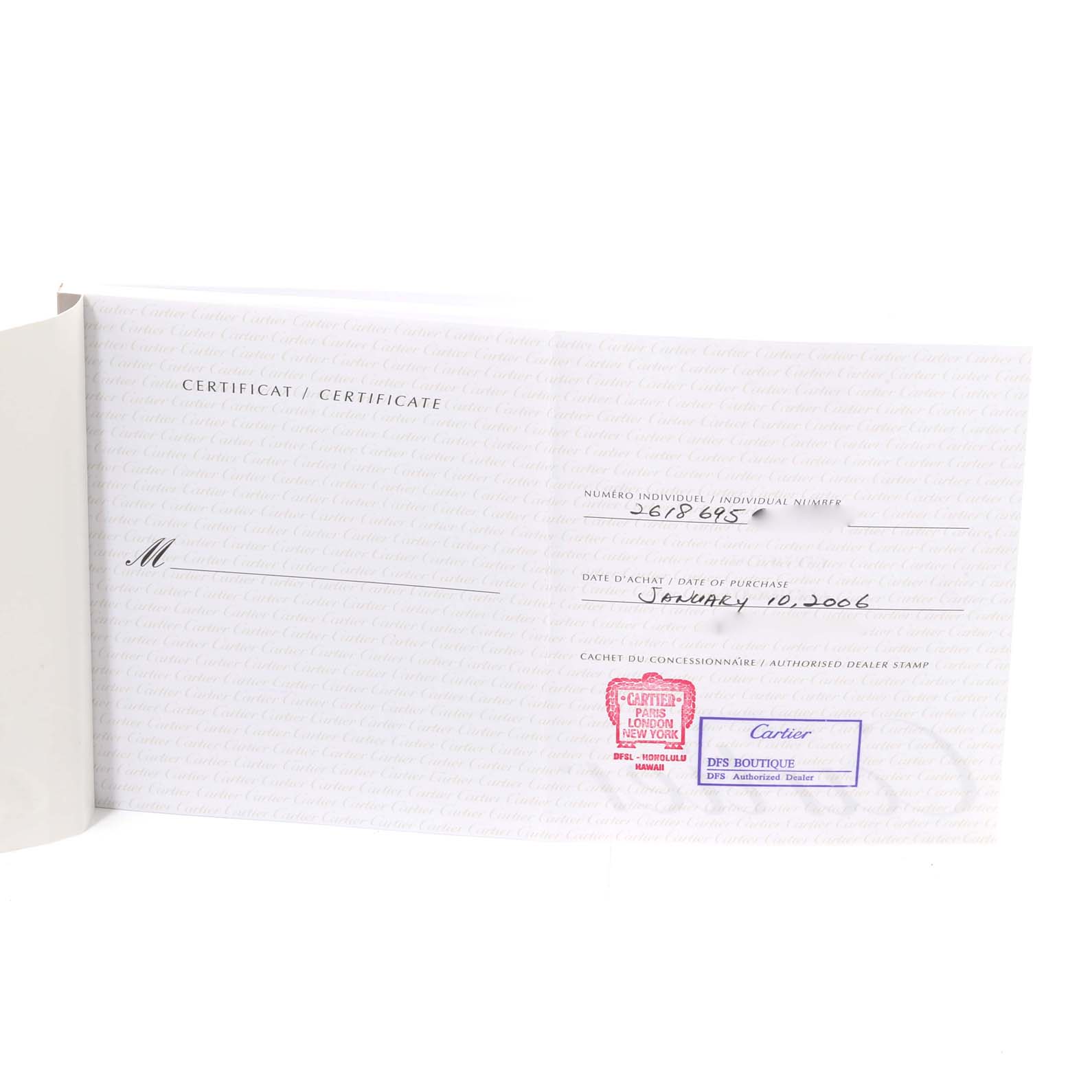 This image shows the purchase certificate for a Cartier Roadster W62019X6 Men's Stainless Steel Silver Dial W62019X6 Men's Stainless Steel Silver Dial watch, including the date of purchase and dealer stamps.