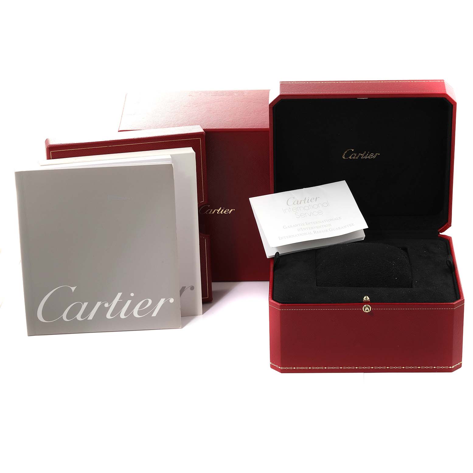 The image shows the packaging and documents for a Cartier Tank Americaine WB7073L1 Women's White Gold Silver Dial WB7073L1 Women's White Gold Silver Dial watch, including a red box, warranty booklet, and manual.