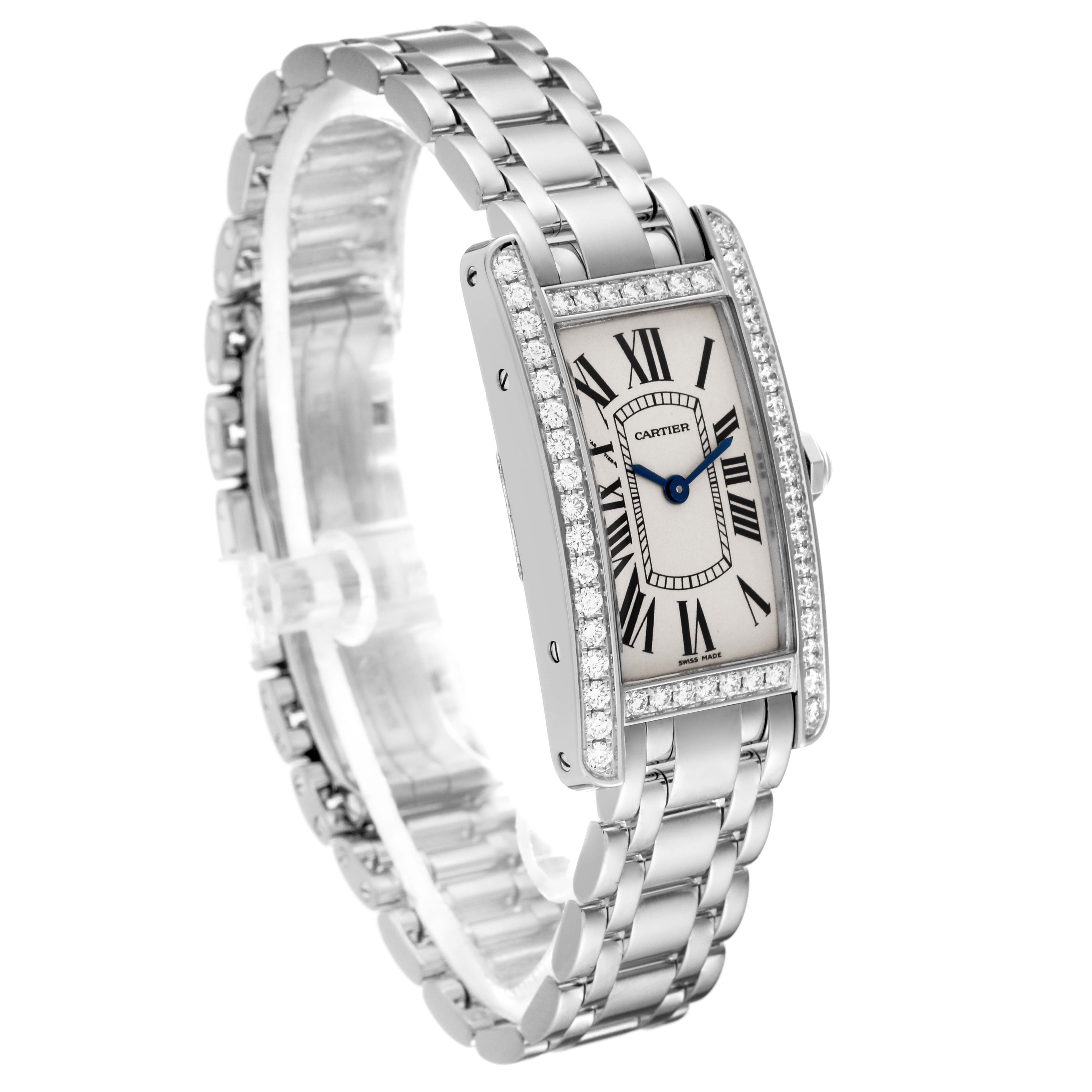 The image shows a side angle of a Cartier Tank Americaine WB7073L1 Women's White Gold Silver Dial WB7073L1 Women's White Gold Silver Dial watch, highlighting its face, bezel, and stainless steel bracelet.