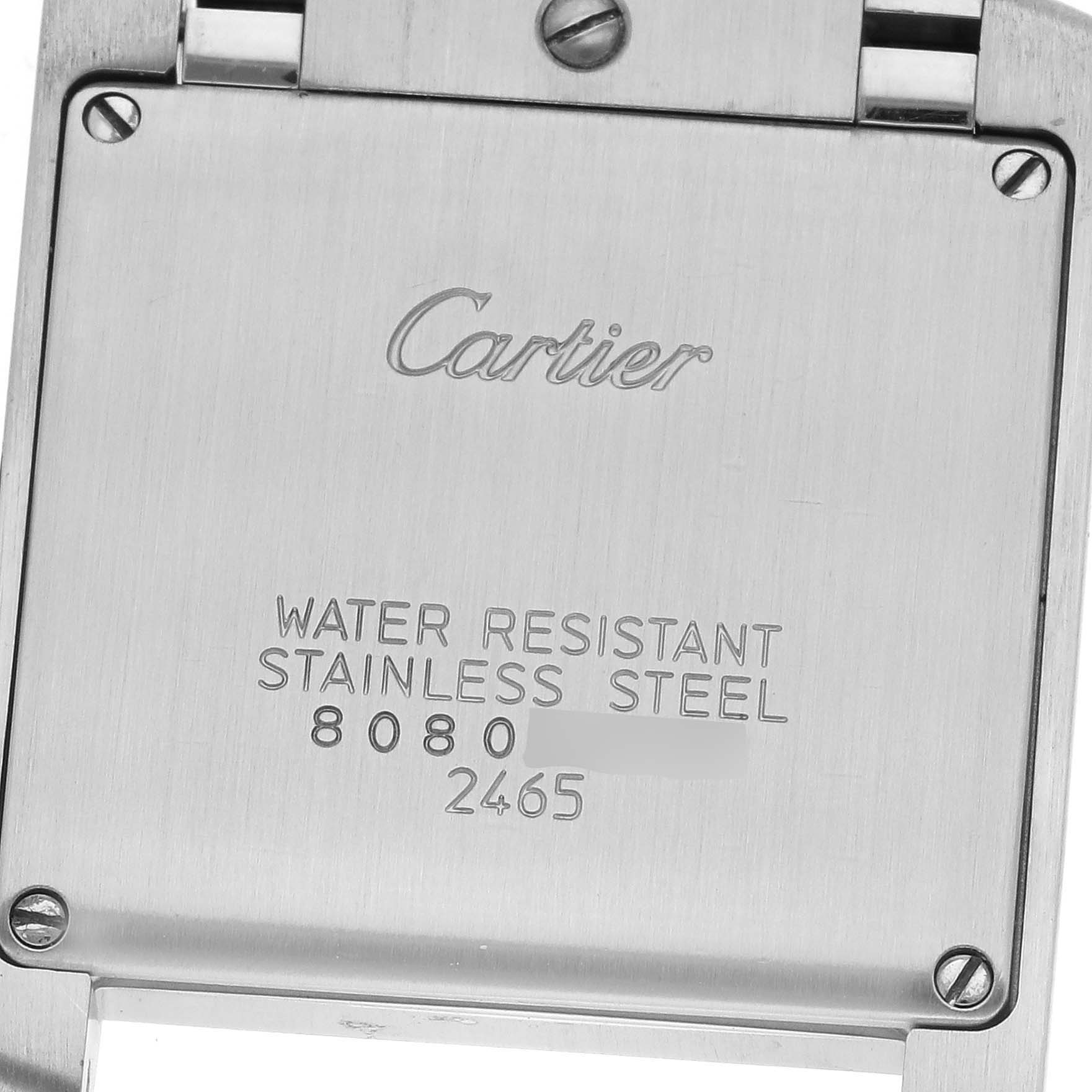 The image shows the back case of a Cartier Tank Française watch, highlighting the brand, model, and technical details.