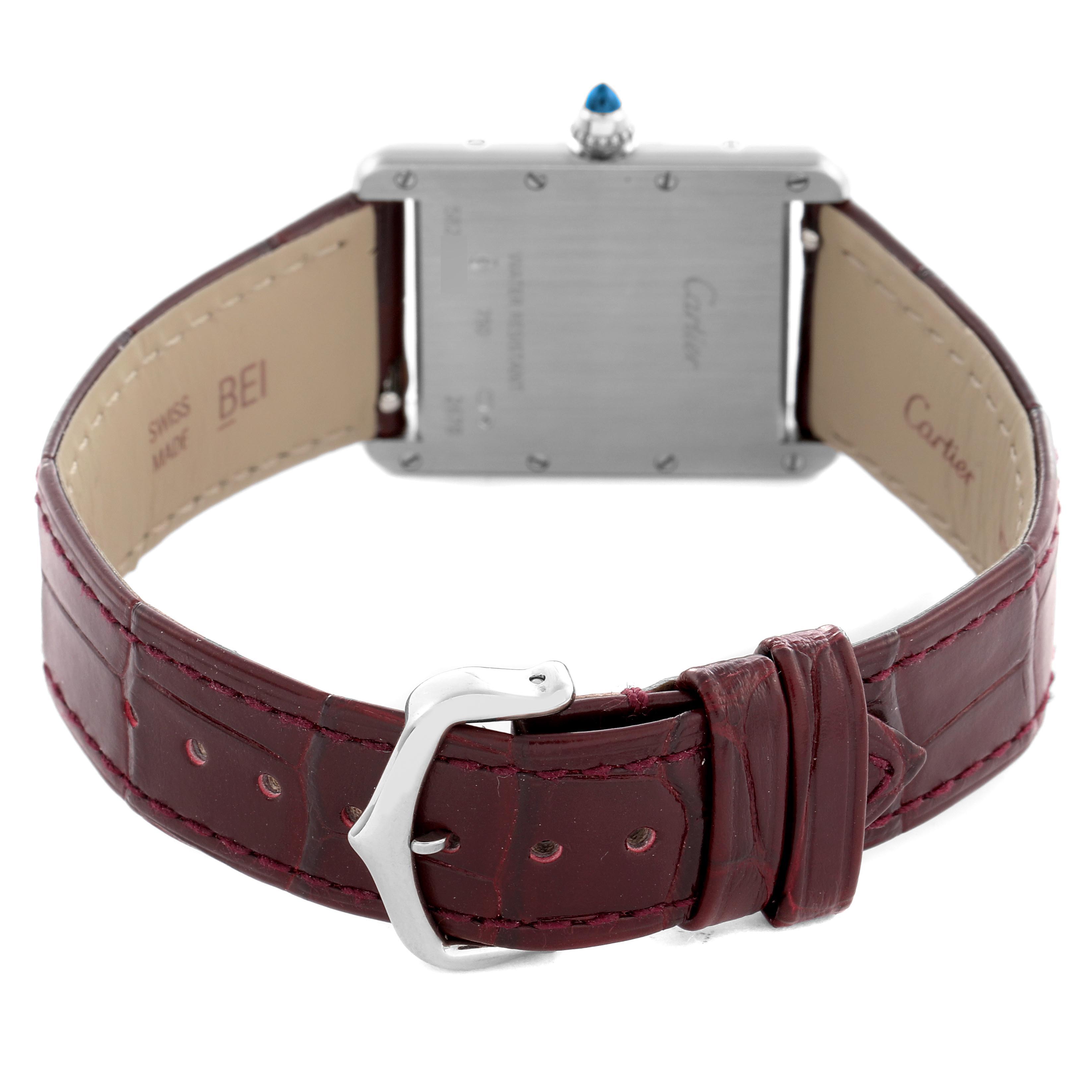 The image shows the back of a Cartier Tank Louis W1540956 Men's White Gold Silver Dial W1540956 Men's White Gold Silver Dial watch at an angle highlighting its case back, strap, and buckle.