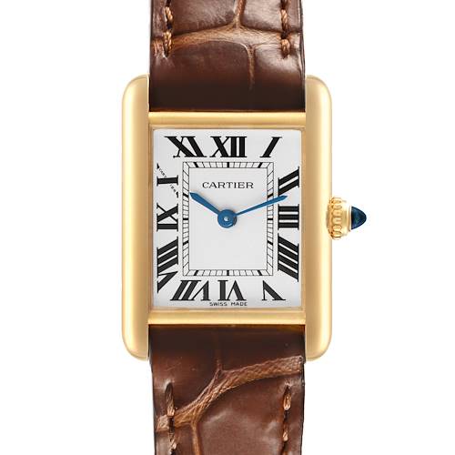 The image shows a Tank Louis Cartier watch front view, featuring a rectangular gold case, brown leather strap, and blue sword hands.