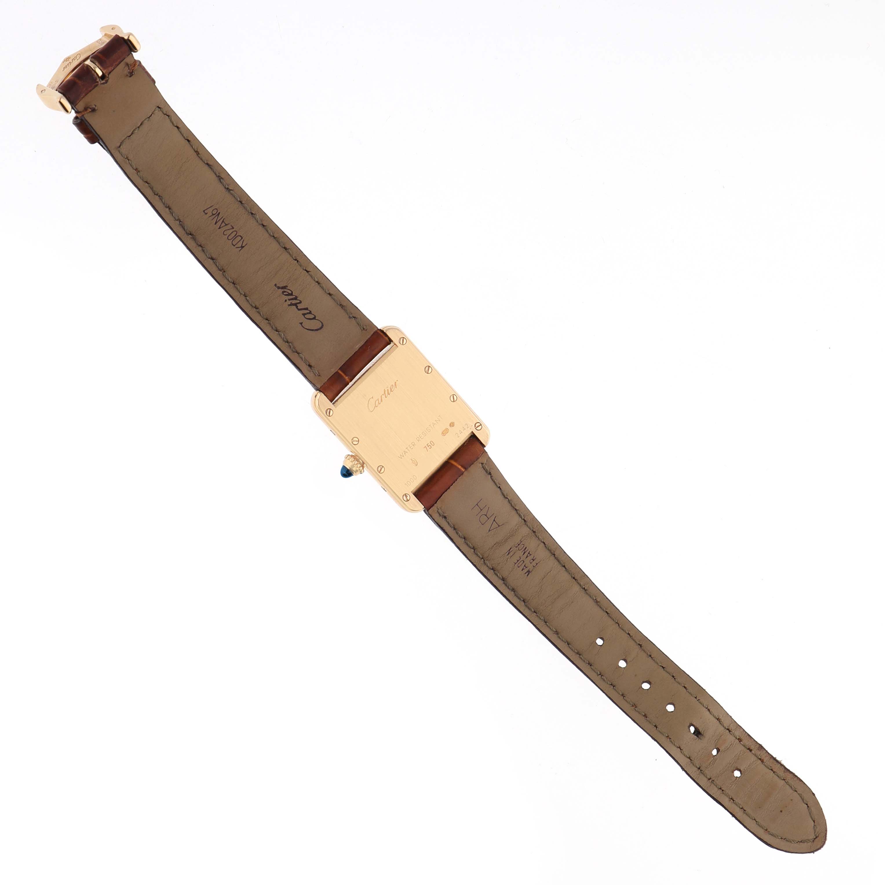 The image shows the back side of a Cartier Tank Louis W1529856 Women's Yellow Gold Silver Dial watch, highlighting the casing, strap, and buckle.