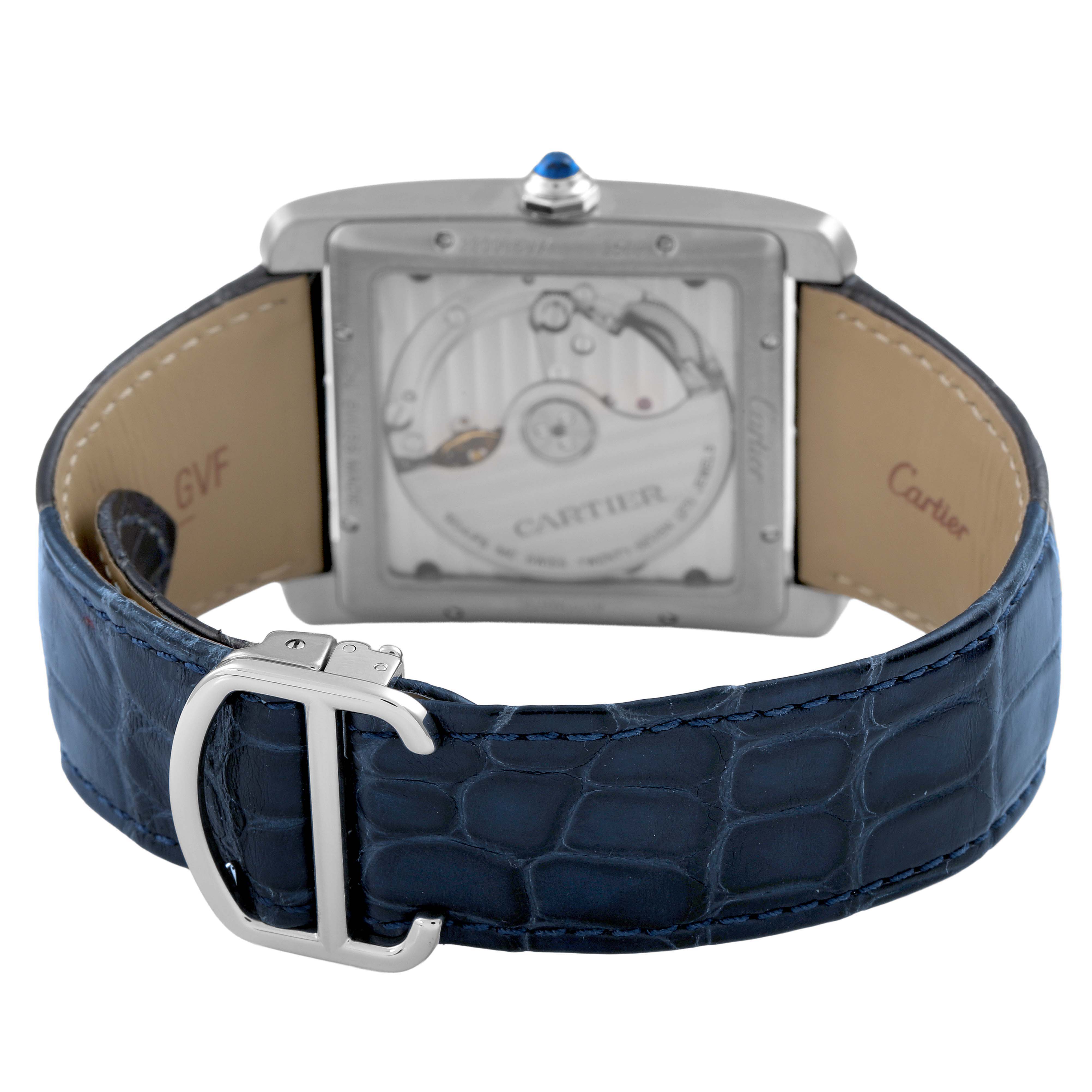 The Cartier Tank MC WSTA0010 Men's Stainless Steel Brown Dial watch is shown from the back, displaying the movement and blue leather strap with a buckle.