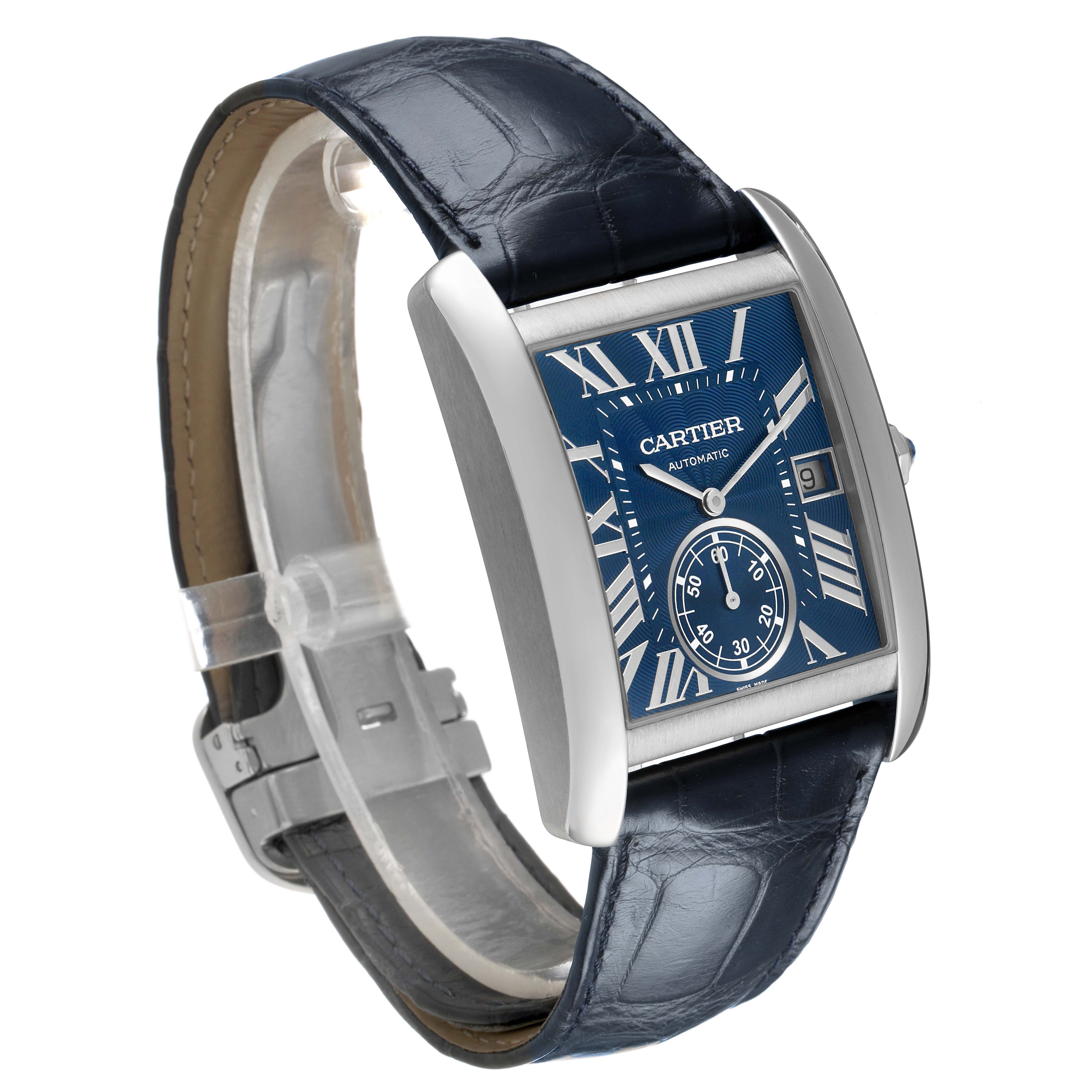 The Cartier Tank MC WSTA0010 Men's Stainless Steel Brown Dial watch is shown at an angled view, highlighting its blue dial, Roman numerals, and leather strap.