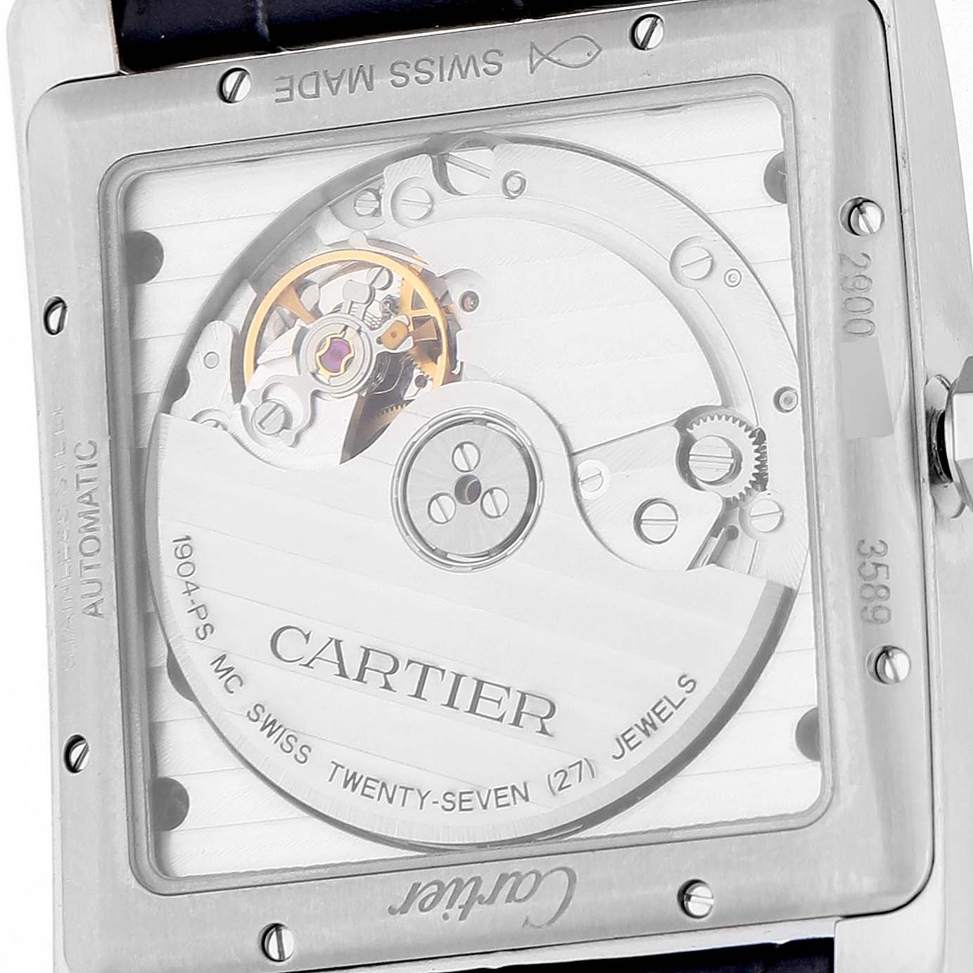 The image shows the back of the Cartier Tank MC WSTA0010 Men's Stainless Steel Brown Dial watch, highlighting its automatic movement and intricate mechanics.