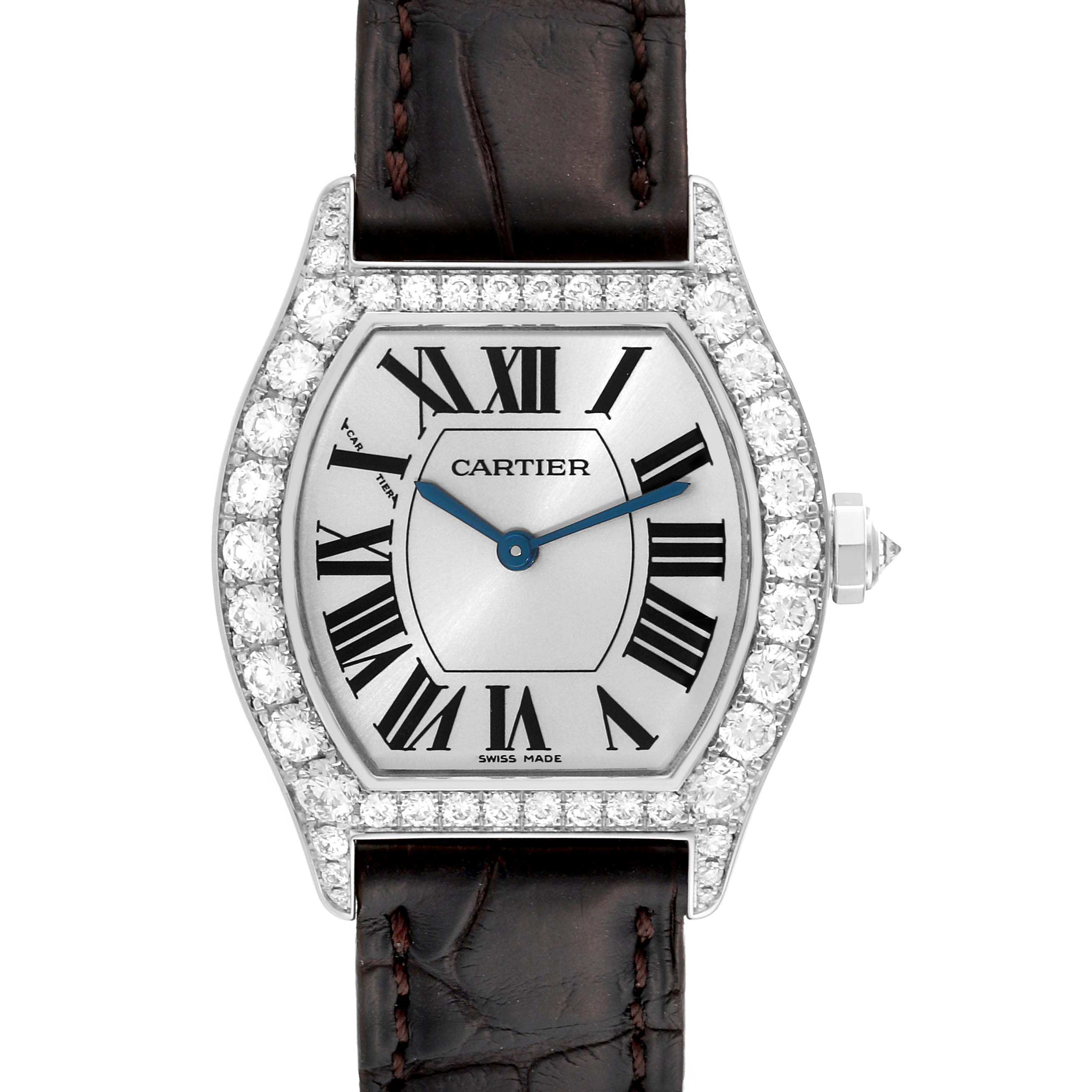 The image shows a top view of a Cartier Tortue WA507231 Women's White Gold Silver Dial WA507231 Women's White Gold Silver Dial watch, displaying the face with Roman numerals, gemstone bezel, and part of the leather strap.