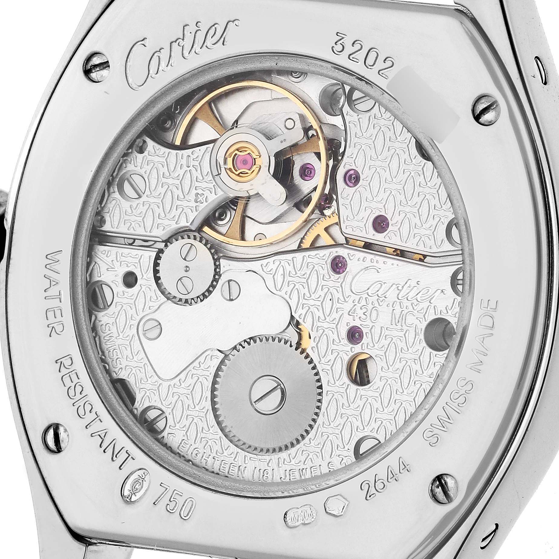 This image shows the intricate movement and back case of the Cartier Tortue WA507231 Women's White Gold Silver Dial WA507231 Women's White Gold Silver Dial watch.
