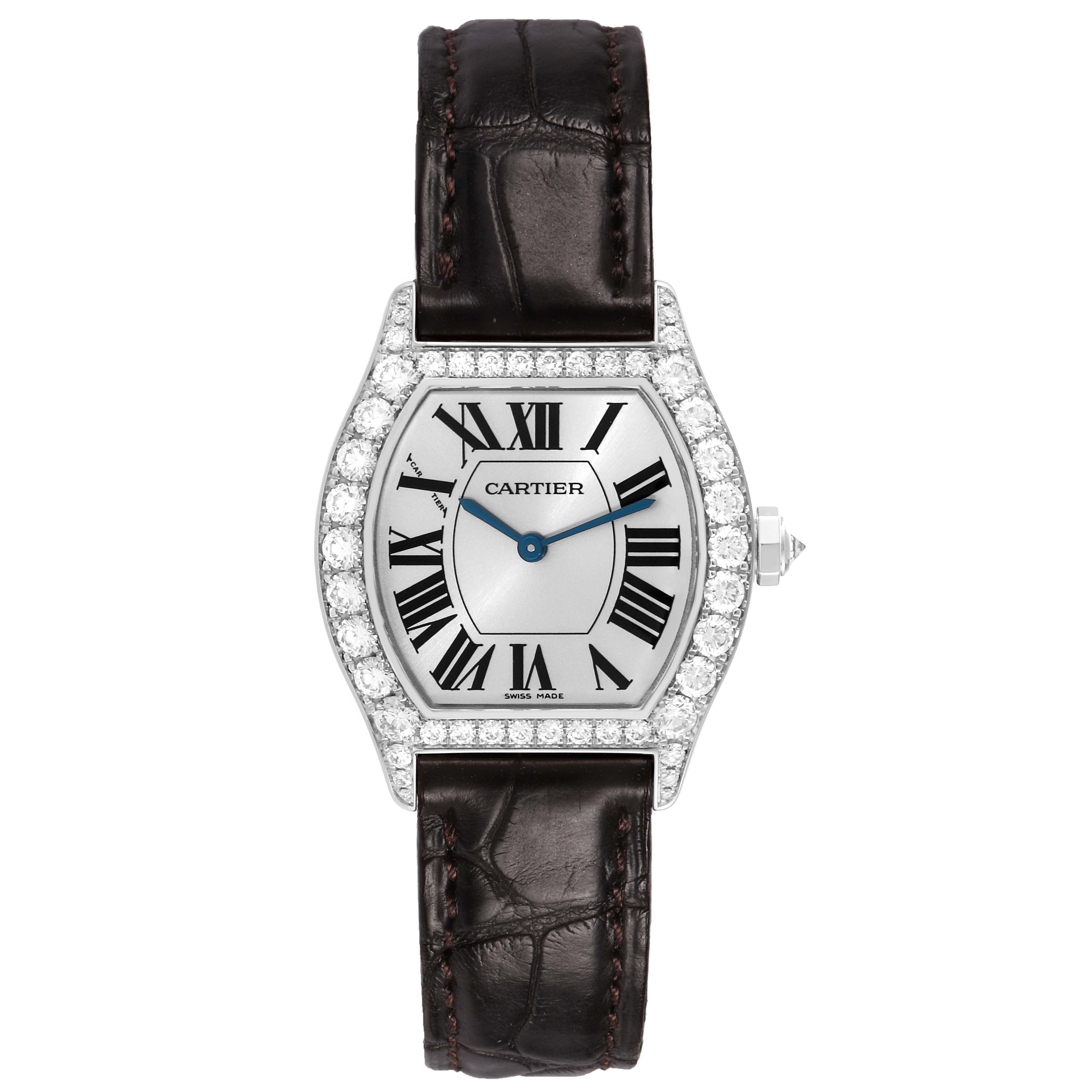 The Cartier Tortue WA507231 Women's White Gold Silver Dial watch is shown from a top-down angle, displaying the face, bezel, and strap.