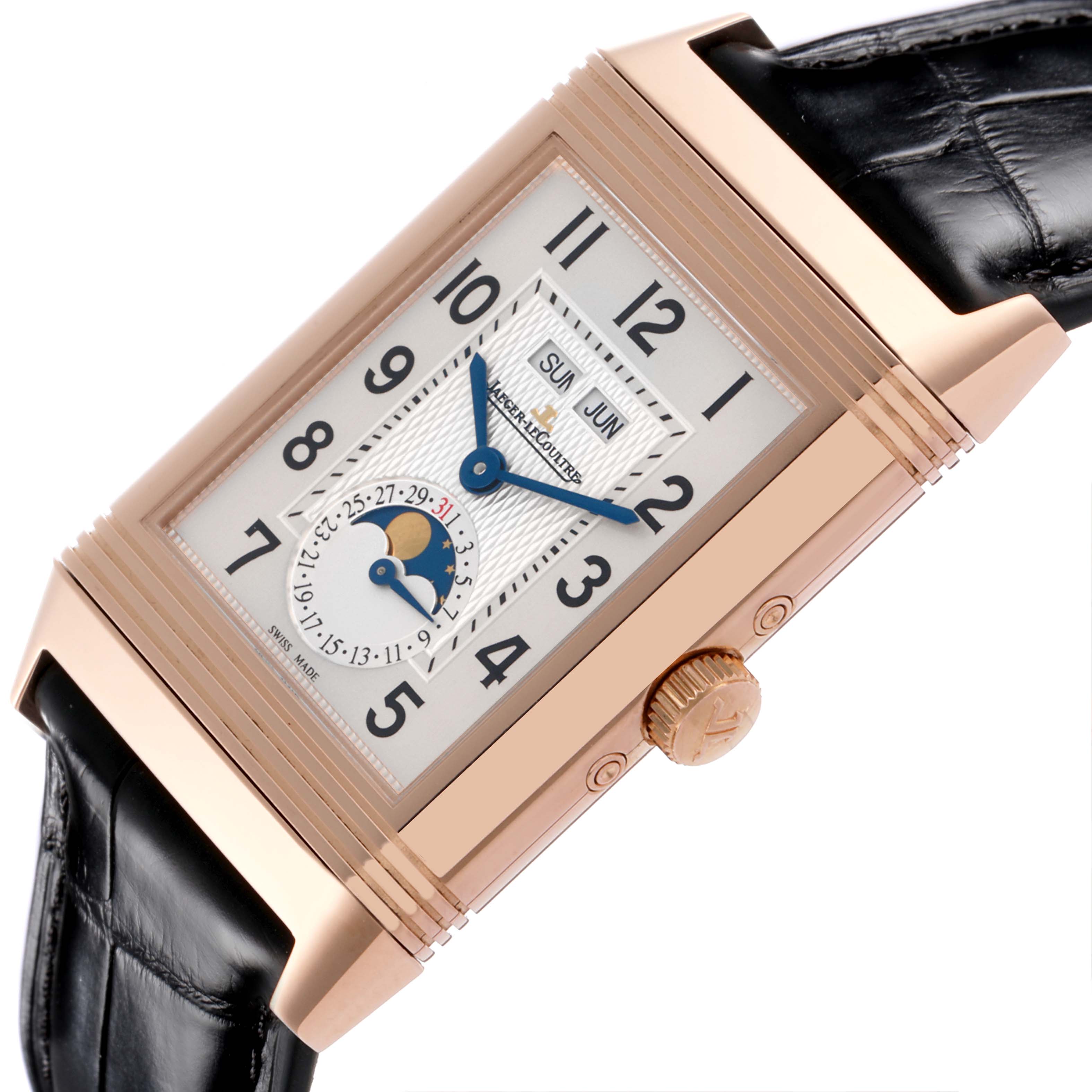 The Jaeger-LeCoultre Reverso watch is shown at a slight angle, highlighting the dial, case, crown, and leather strap.