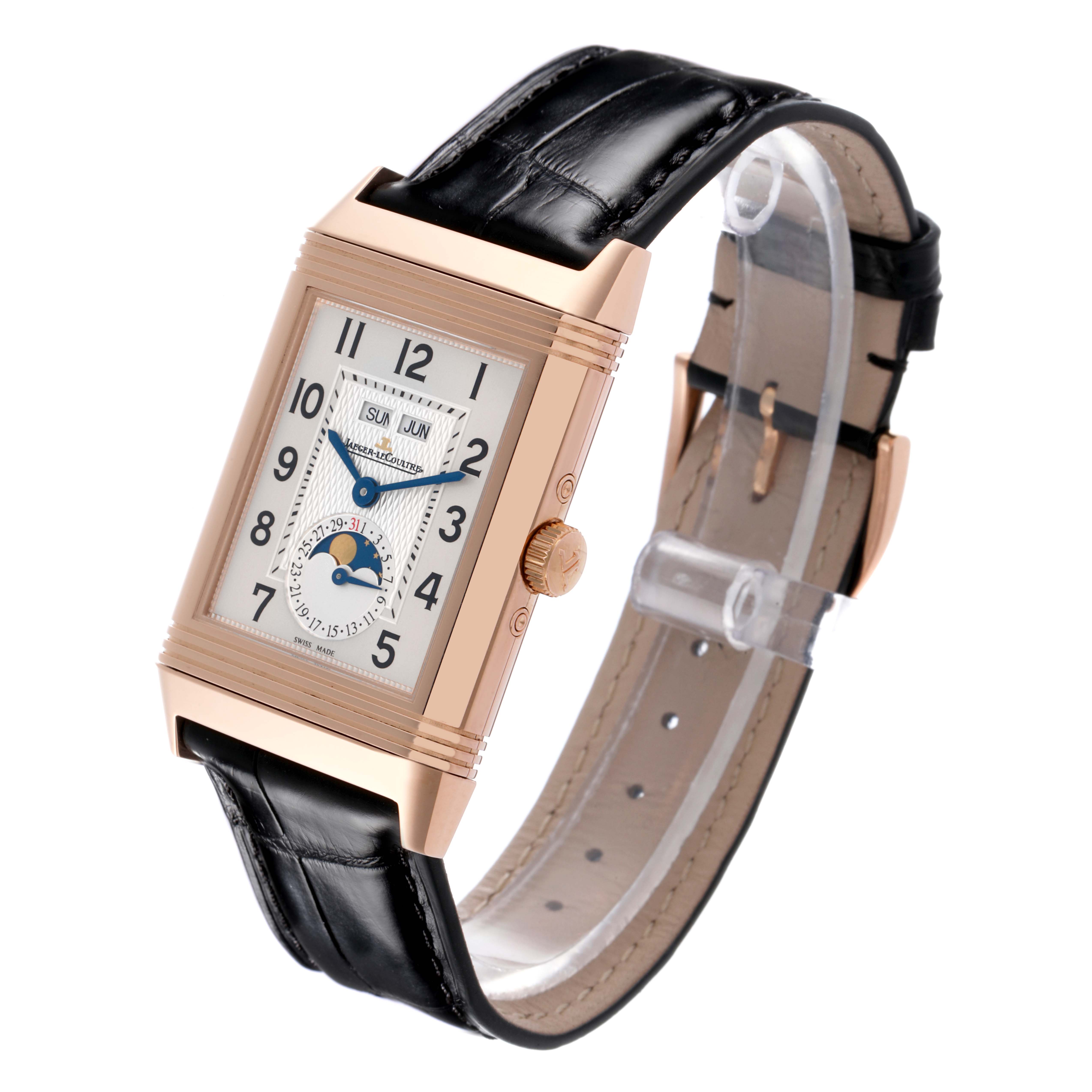 The Jaeger-LeCoultre Reverso model is shown at a slight angle, highlighting the rectangular face, leather strap, and side crown.