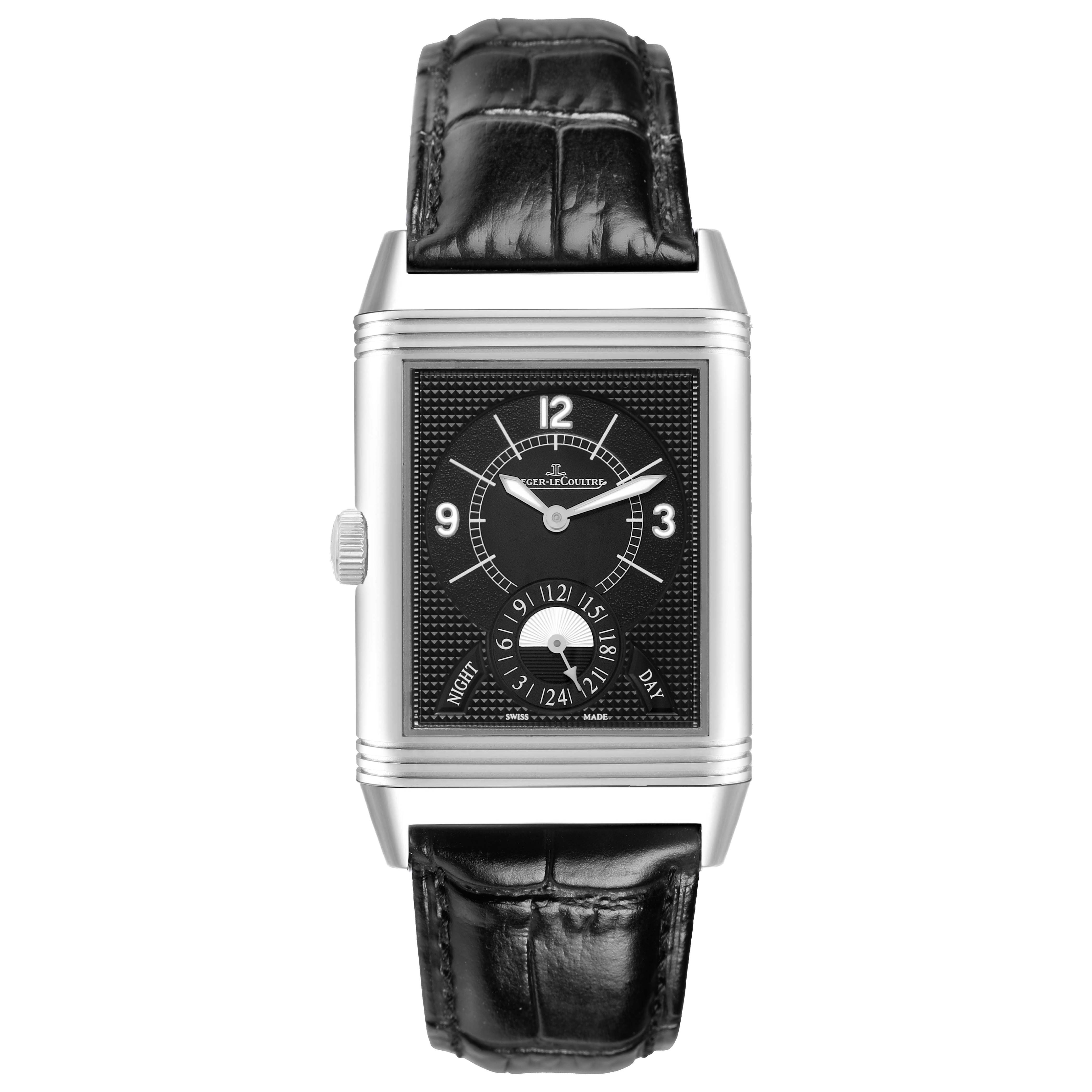 The image shows a frontal view of the Jaeger-LeCoultre Reverso, highlighting its black dial, rectangular case, and leather strap.