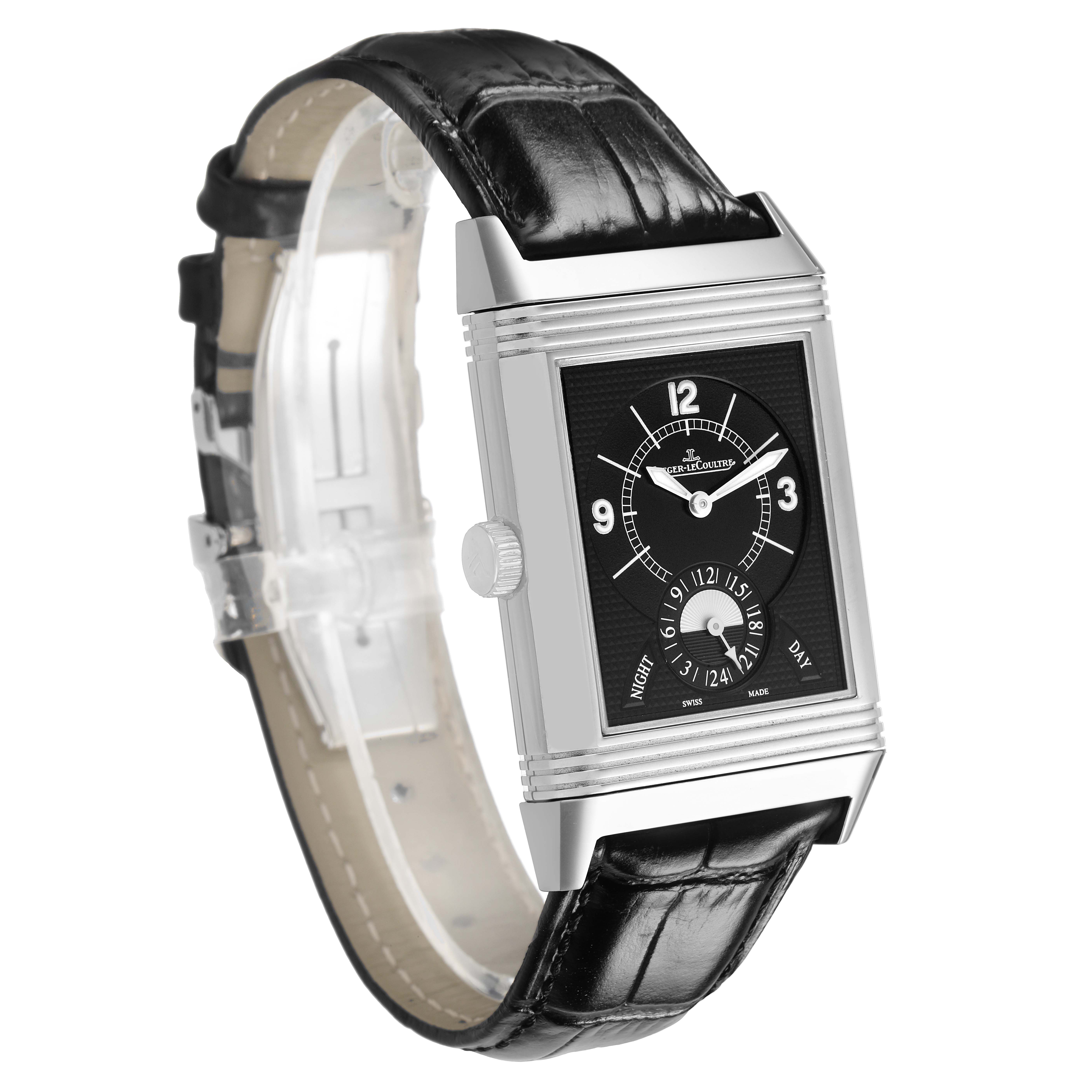 The Jaeger-LeCoultre Reverso watch is shown at a 3/4 angle, highlighting the black dial, case, leather strap, and side crown.