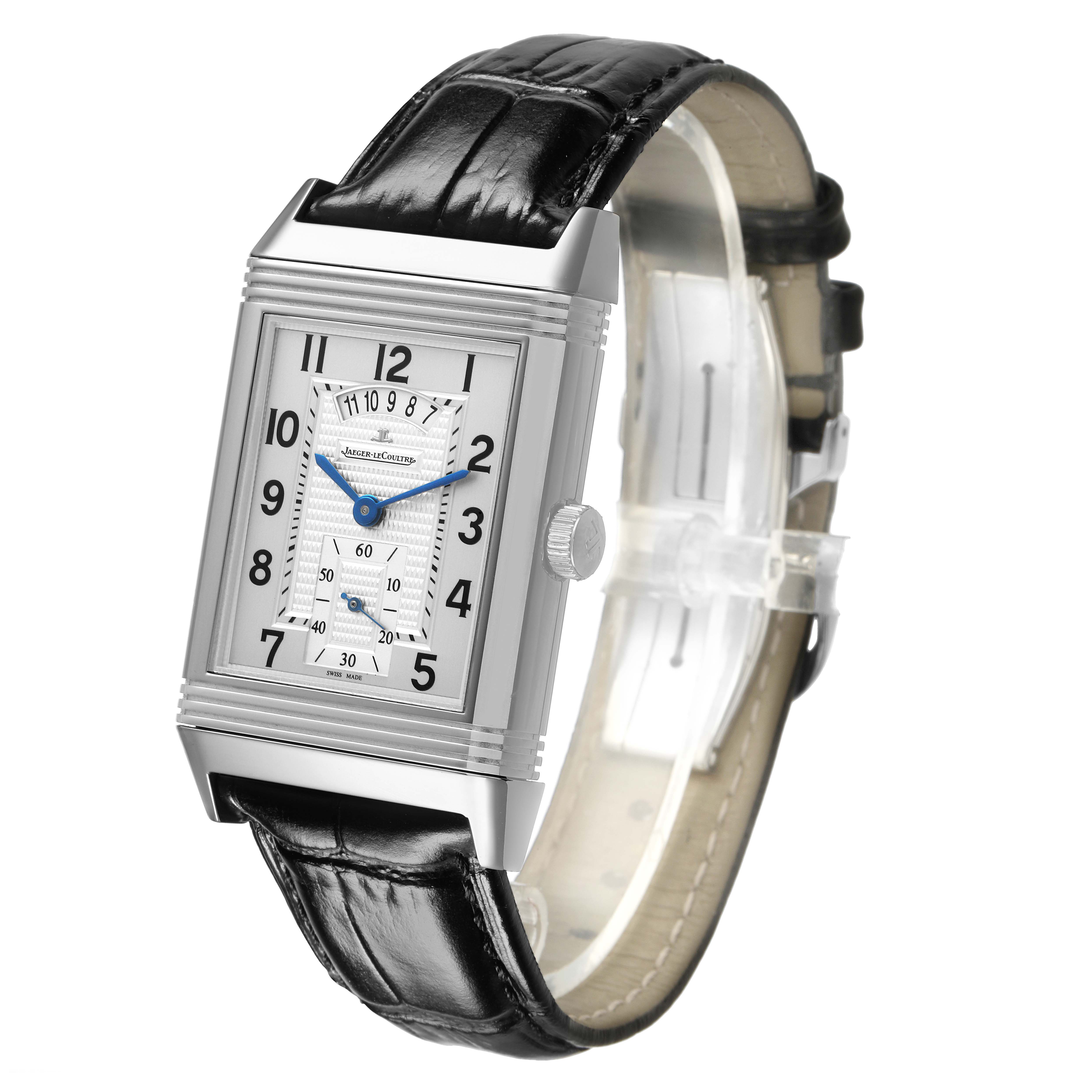 The Jaeger-LeCoultre Reverso watch is shown at a three-quarter angle, highlighting its rectangular case, dial, and black leather strap.