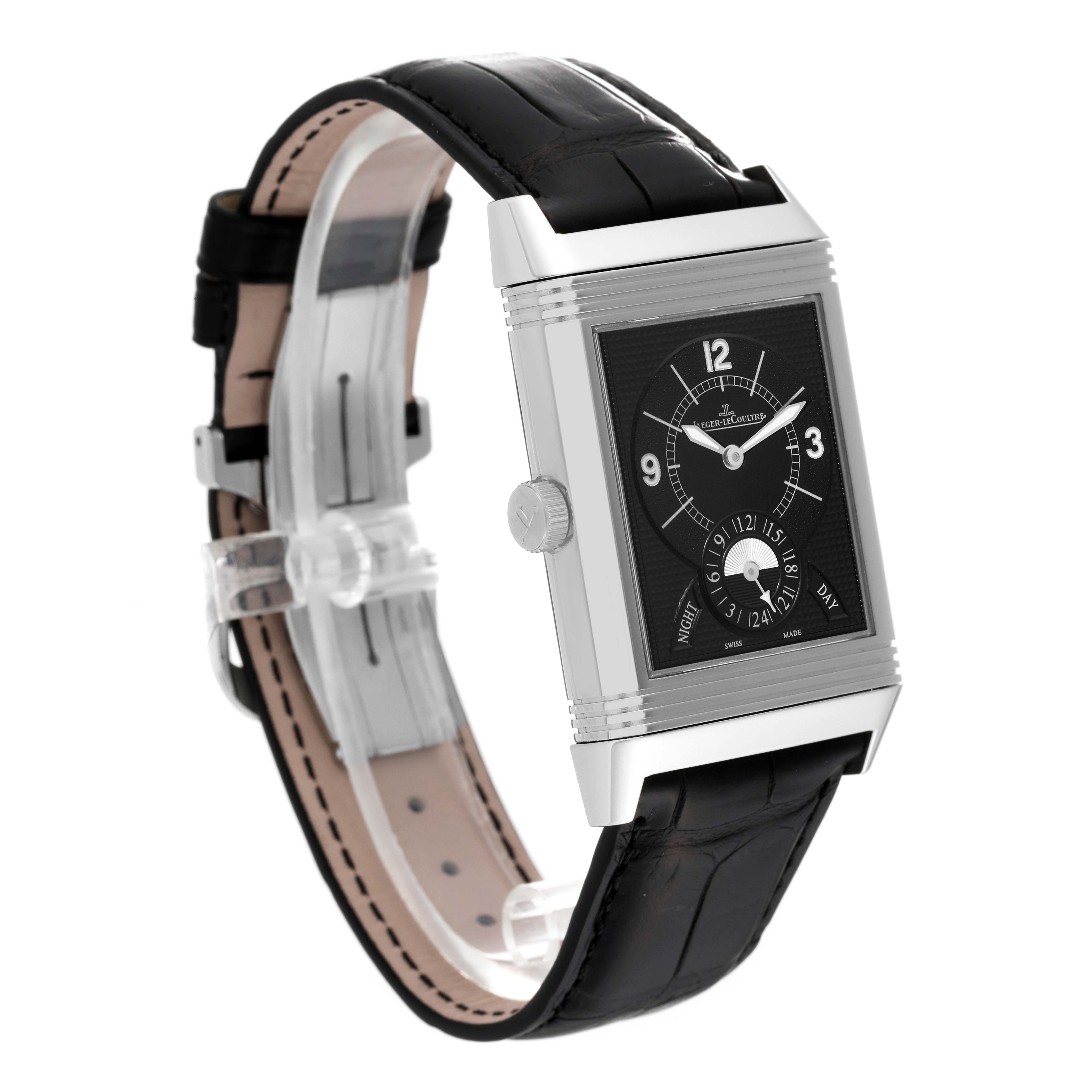 The image shows a Jaeger LeCoultre Reverso Q3748421 Men's Stainless Steel Silver Dial Q3748421 Men's Stainless Steel Silver Dial watch angled to display its rectangular face, leather strap, and clasp.