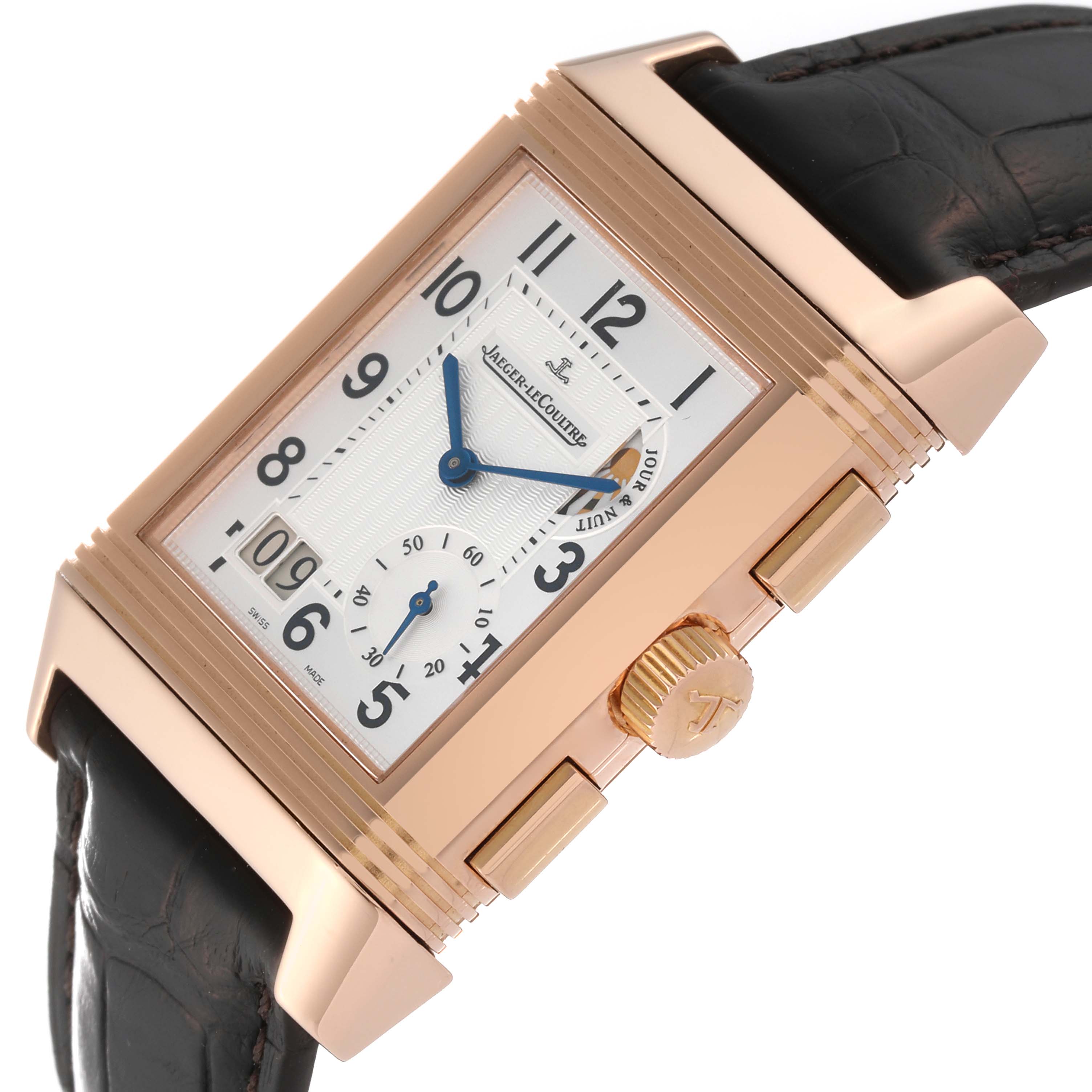 The image shows a Jaeger LeCoultre Reverso Q3022420 Men's Rose Gold Silver Dial Q3022420 Men's Rose Gold Silver Dial watch at an angle highlighting the crown, side view, and partial strap.