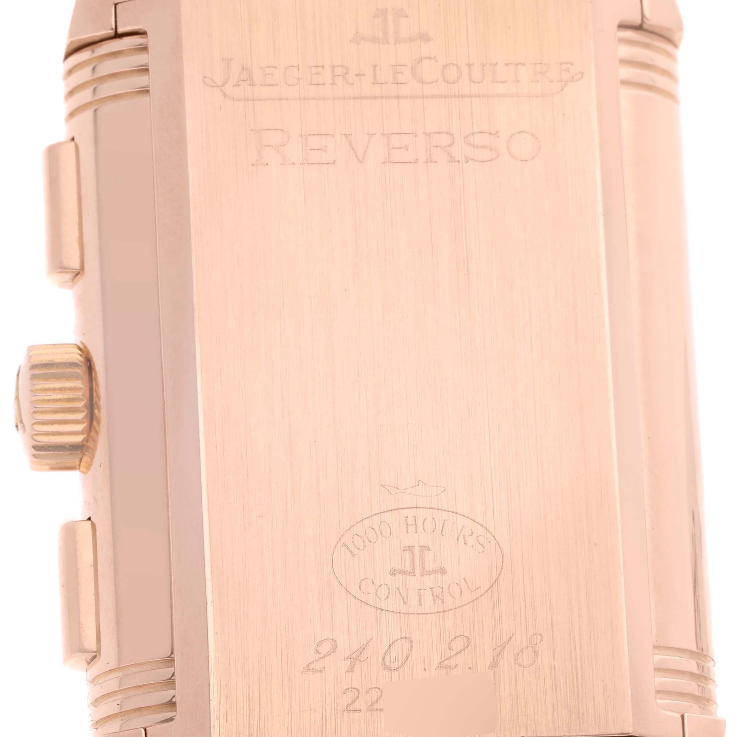 The image shows the back casing and part of the crown of a Jaeger-LeCoultre Reverso watch.
