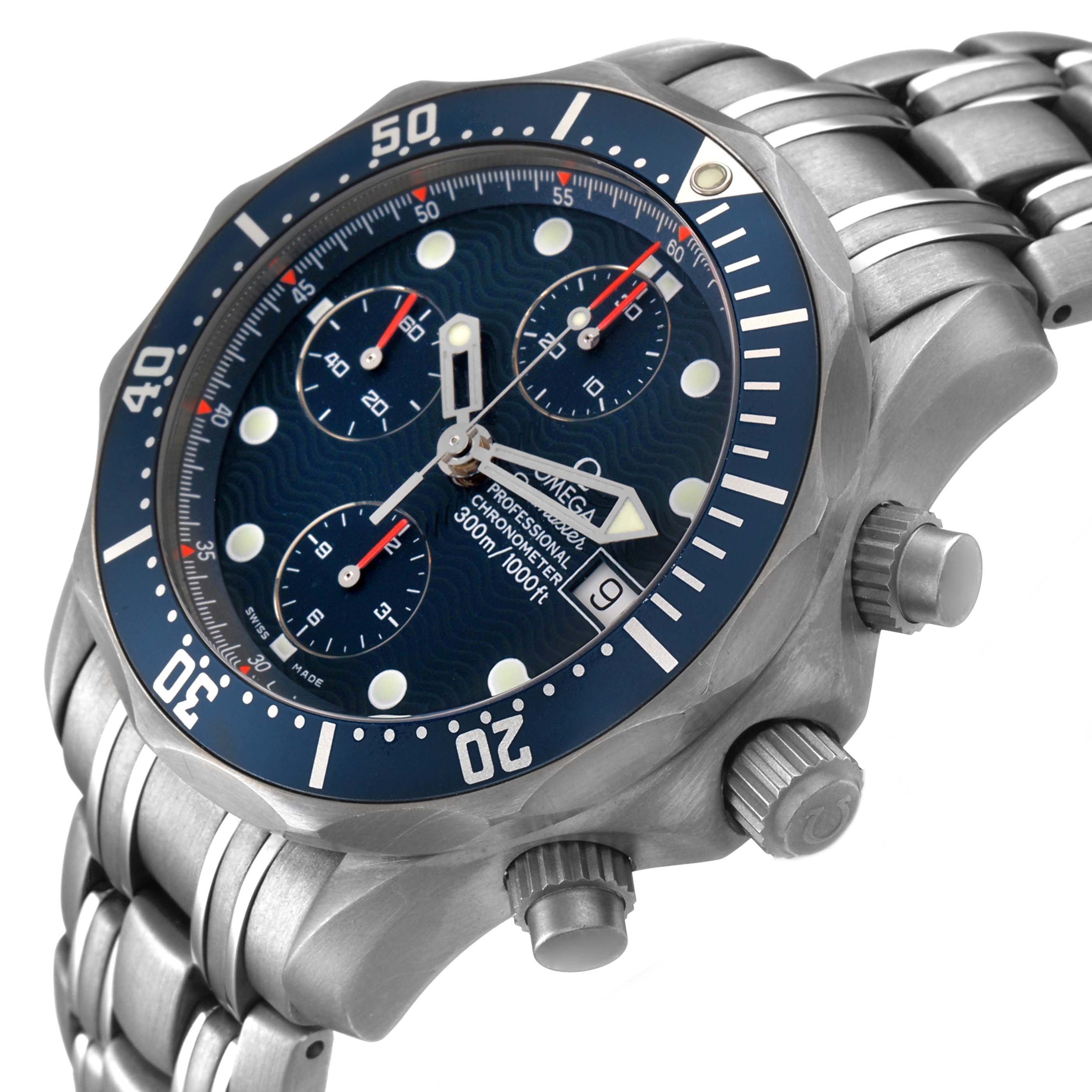 The Omega Seamaster 2298.80.00 Men's Titanium Blue Dial watch is shown at an angle highlighting the bezel, crown, pushers, and the bracelet.