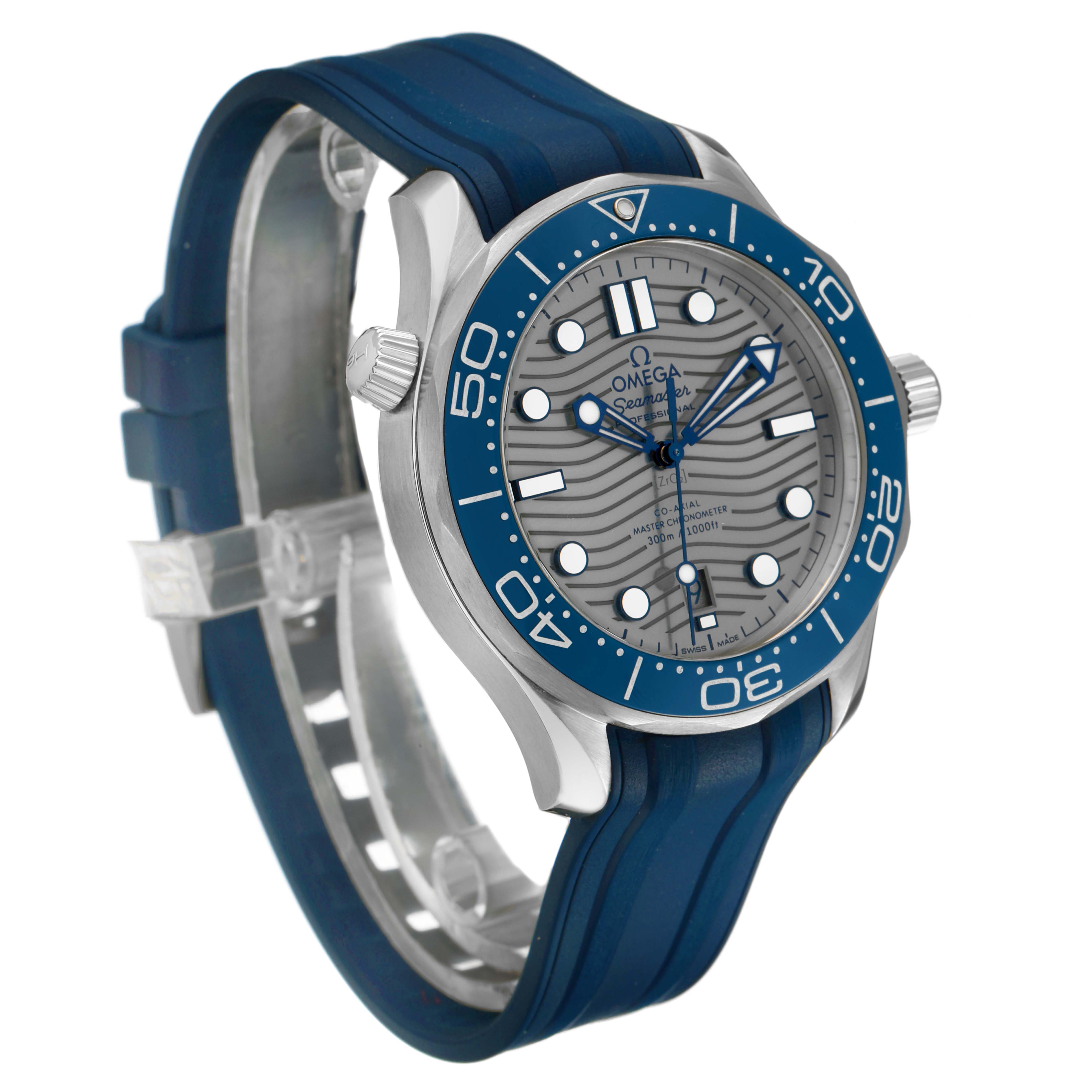 The Omega Seamaster 210.32.42.20.06.001 Men's Stainless Steel Grey Dial watch is shown at a three-quarter angle, highlighting the face, bezel, and blue rubber strap.