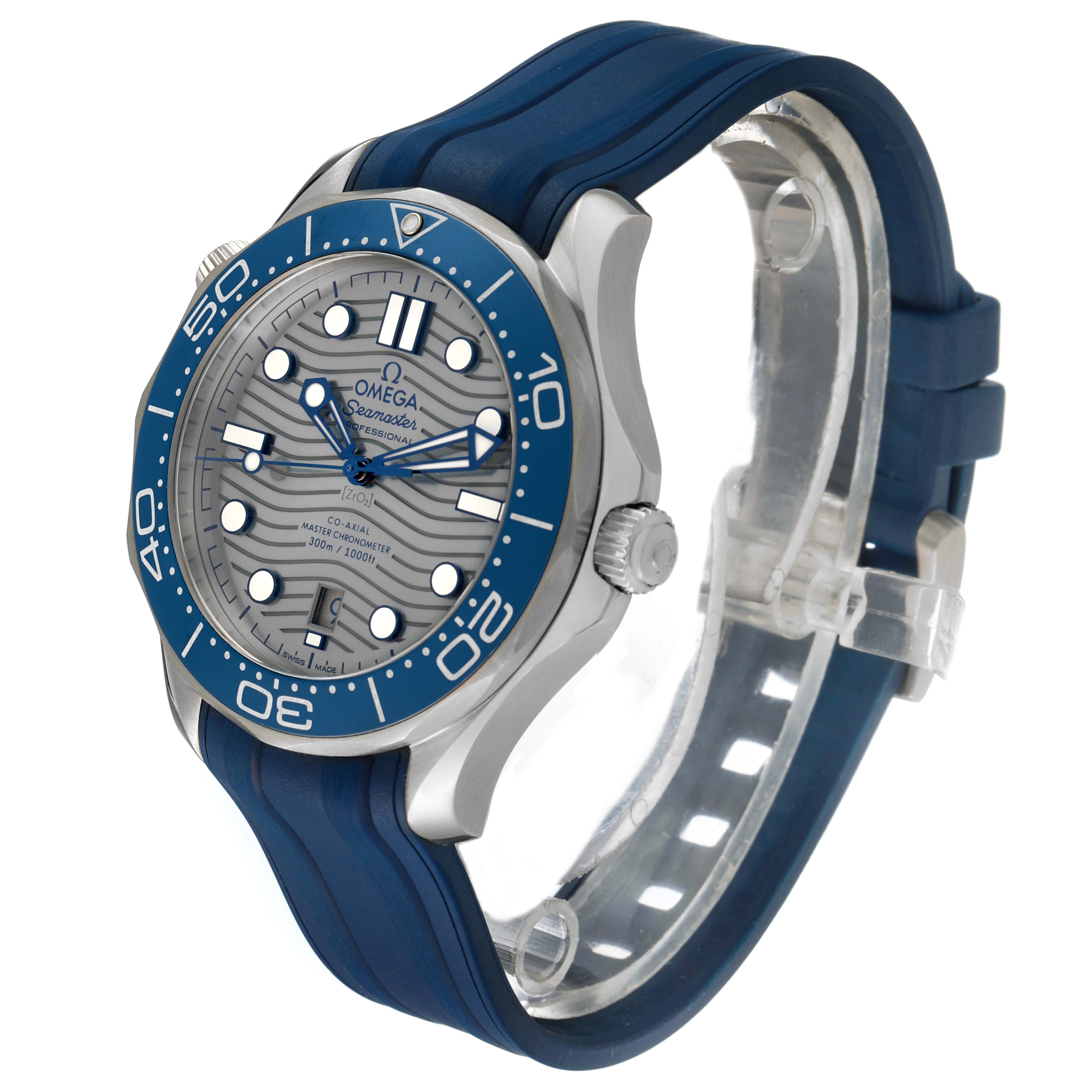 The Omega Seamaster 210.32.42.20.06.001 Men's Stainless Steel Grey Dial watch is shown at an angle highlighting the face, bezel, crown, and blue strap.