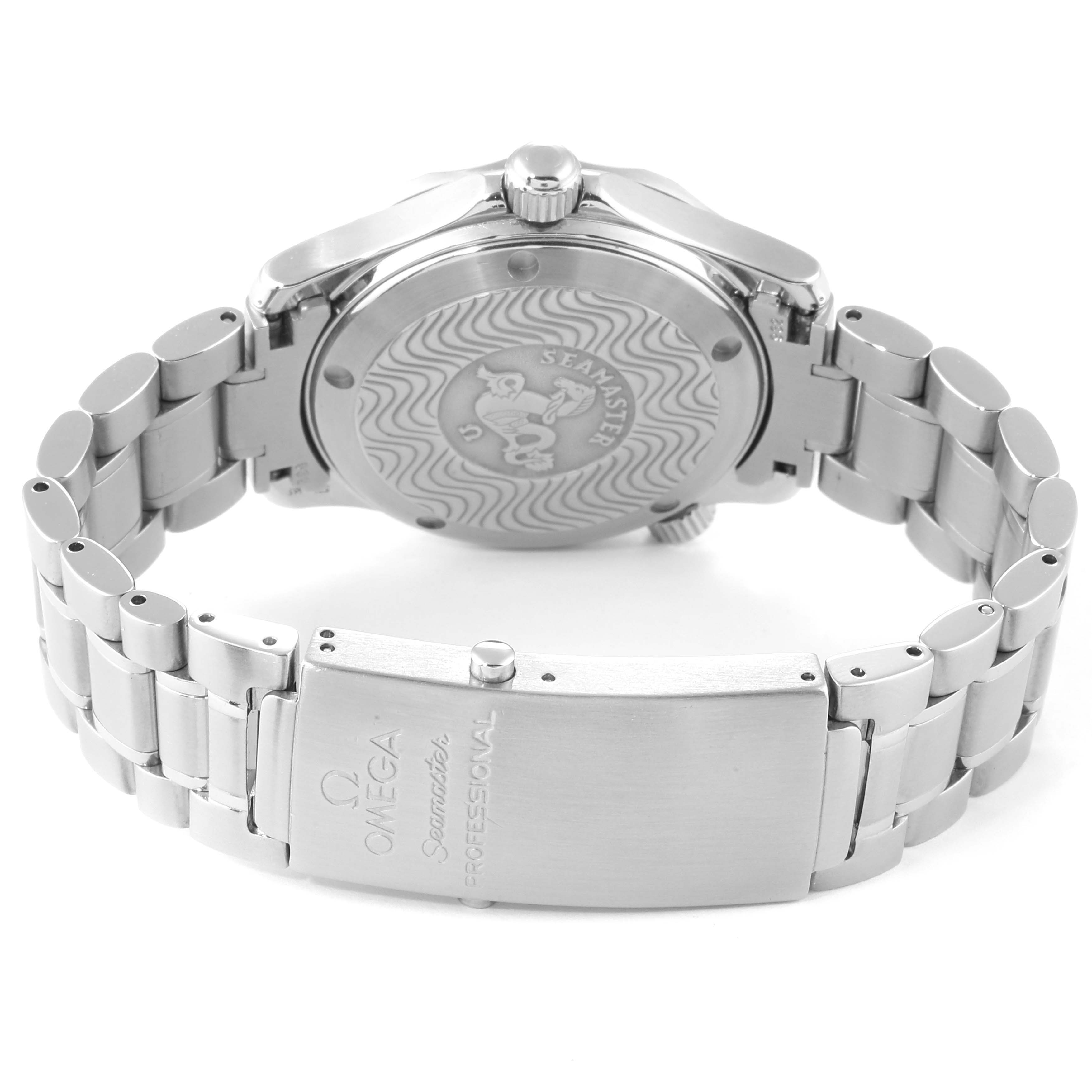 The image shows the back and clasp of an Omega Seamaster wristwatch, with a focus on the bracelet and engraved case back.