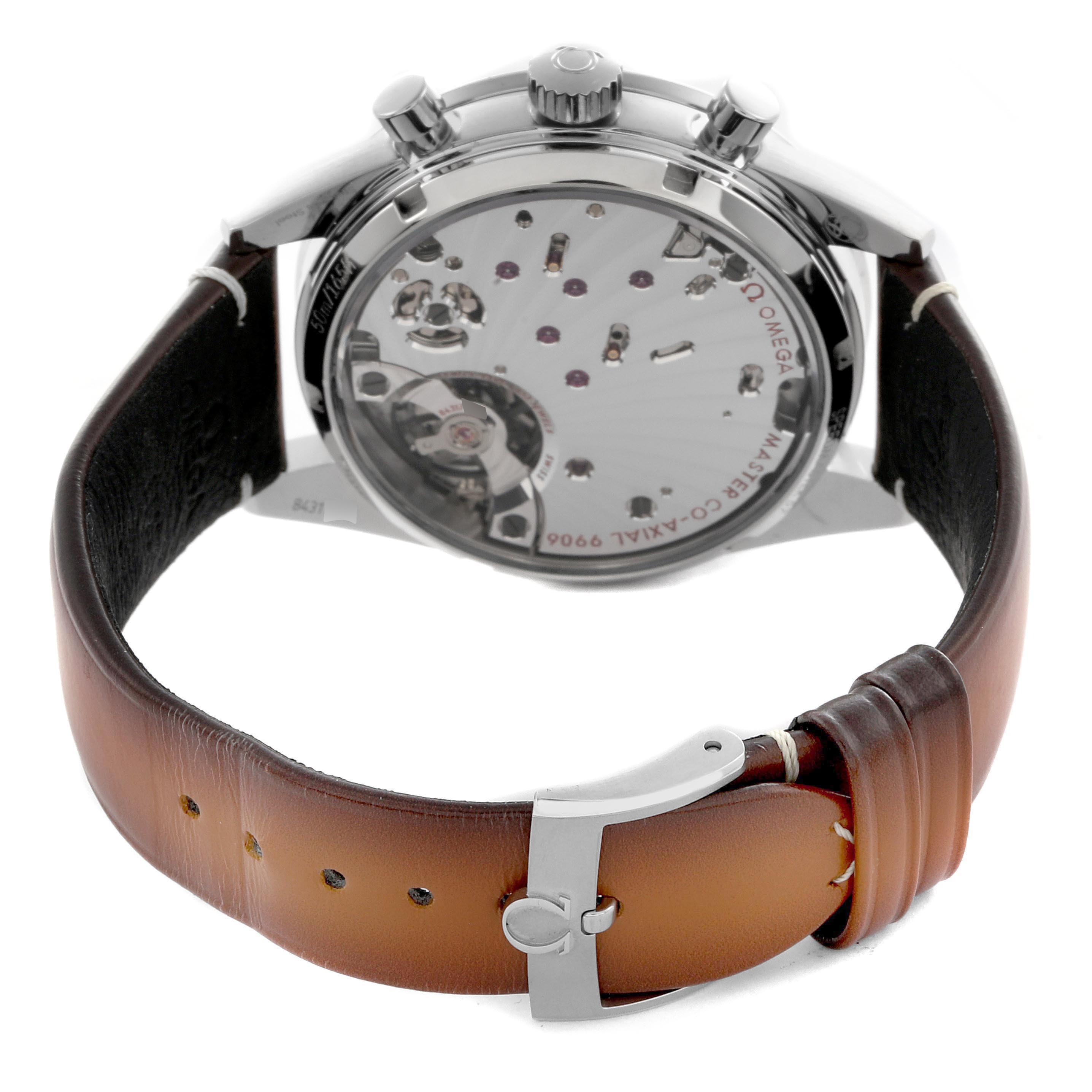 The Omega Speedmaster 332.12.41.51.01.001 Men's Stainless Steel Black Dial 332.12.41.51.01.001 Men's Stainless Steel Black Dial watch is shown from the back, displaying the movement and the brown leather strap with a silver buckle.