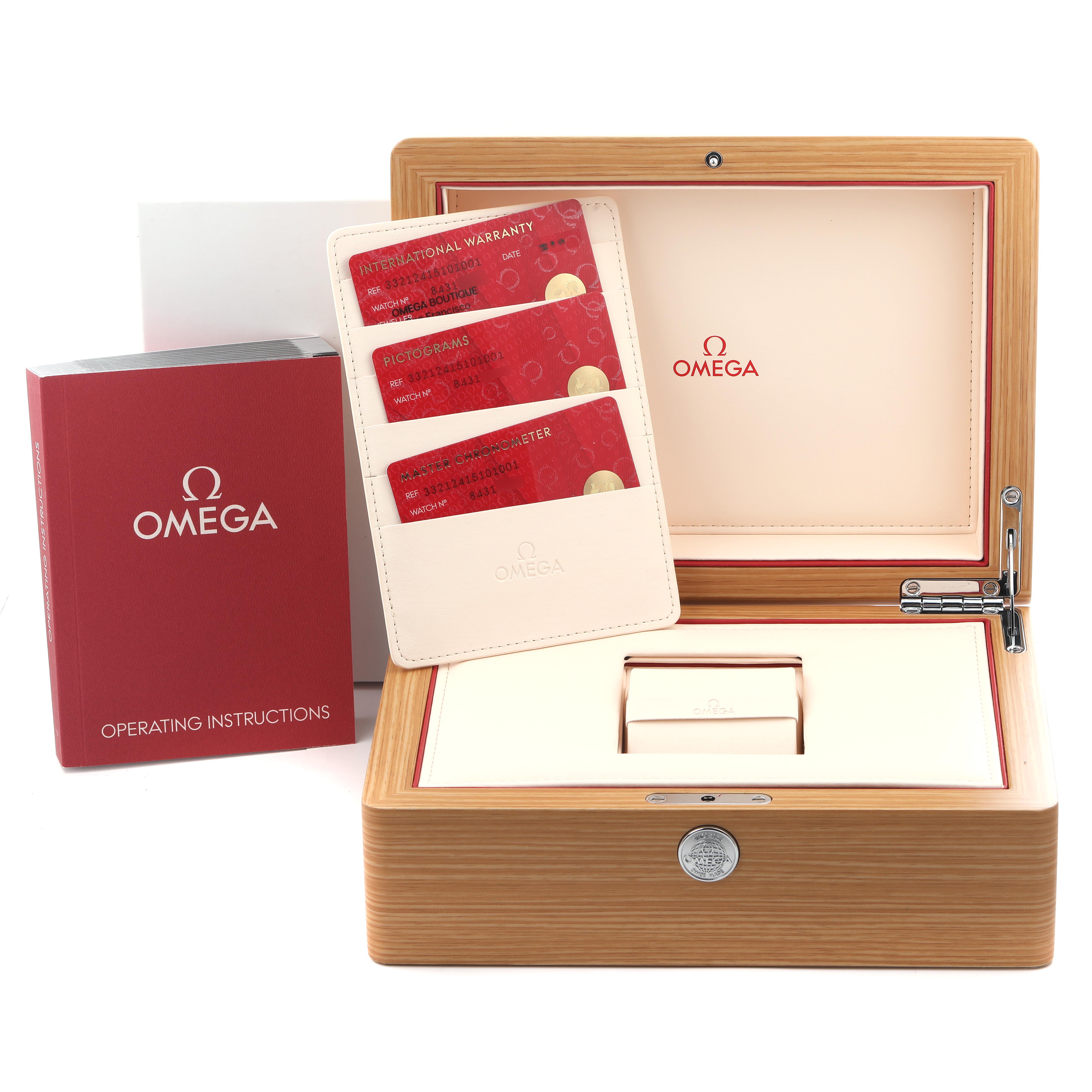 The image shows Omega Speedmaster 332.12.41.51.01.001 Men's Stainless Steel Black Dial 332.12.41.51.01.001 Men's Stainless Steel Black Dial watch accessories including a box, warranty cards, and an instruction booklet.