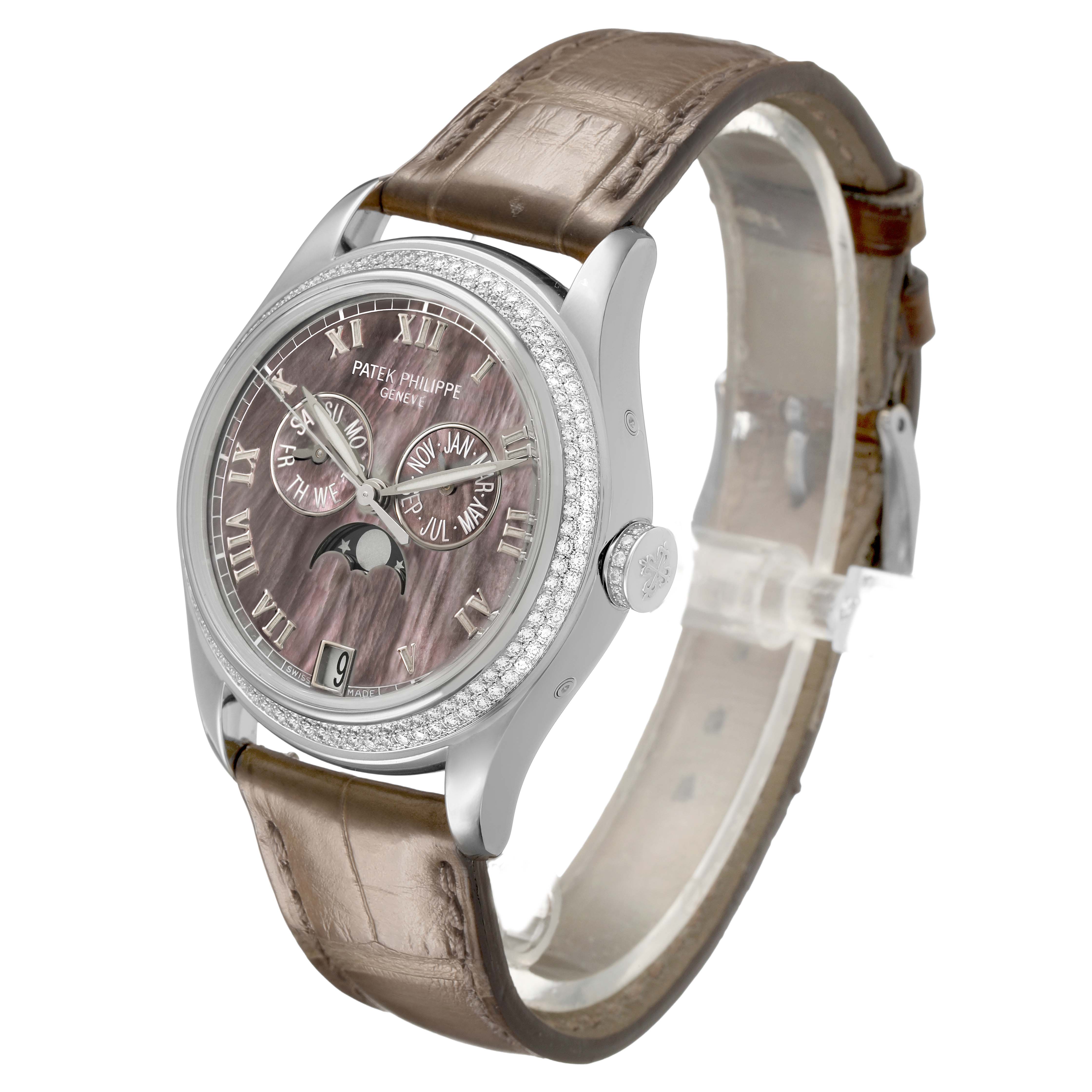 The Patek Philippe Complications 4936G - 001 Men's White Gold Mother of Pearl Dial watch is shown at a three-quarter angle, highlighting the dial, bezel, and leather strap.