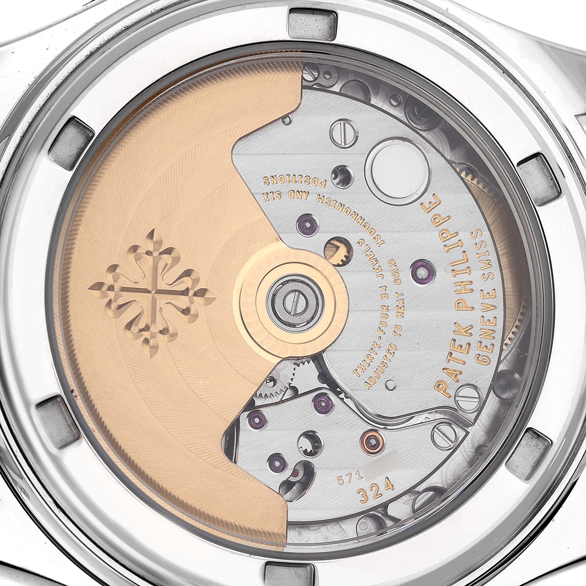 The image shows the back view of the Patek Philippe Complications 4936G - 001 Men's White Gold Mother of Pearl Dial model, highlighting the rotor and intricate movement.