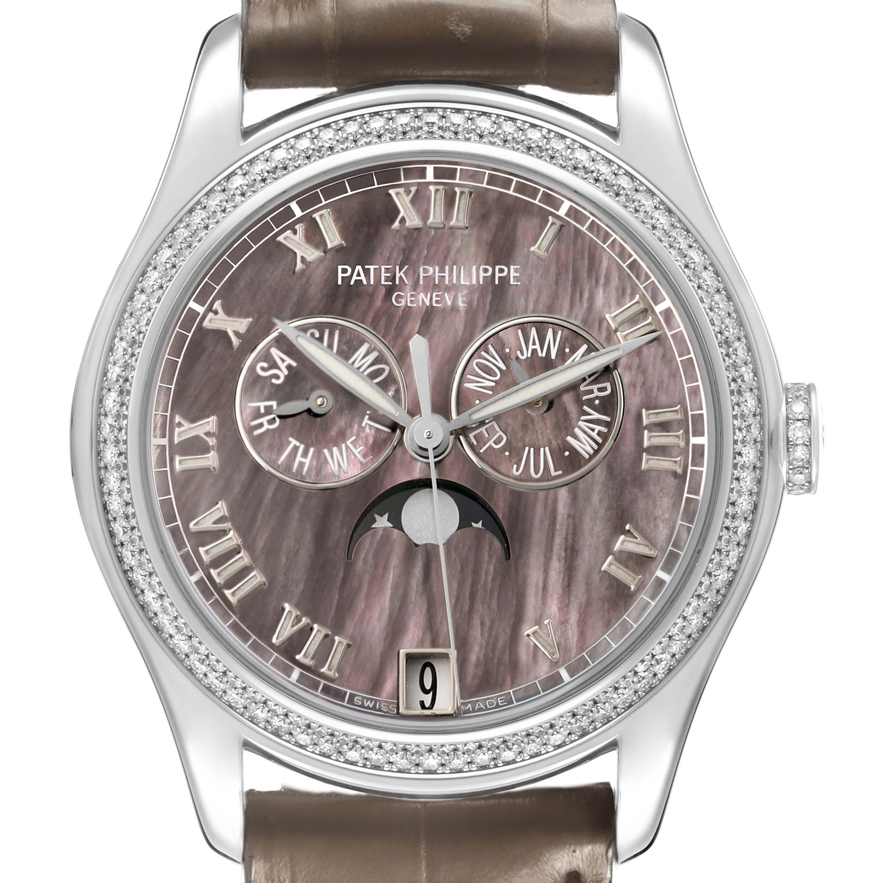 The Patek Philippe Complications 4936G - 001 Men's White Gold Mother of Pearl Dial watch is shown from a front angle, highlighting its dial, subdials, and diamond-encrusted bezel.