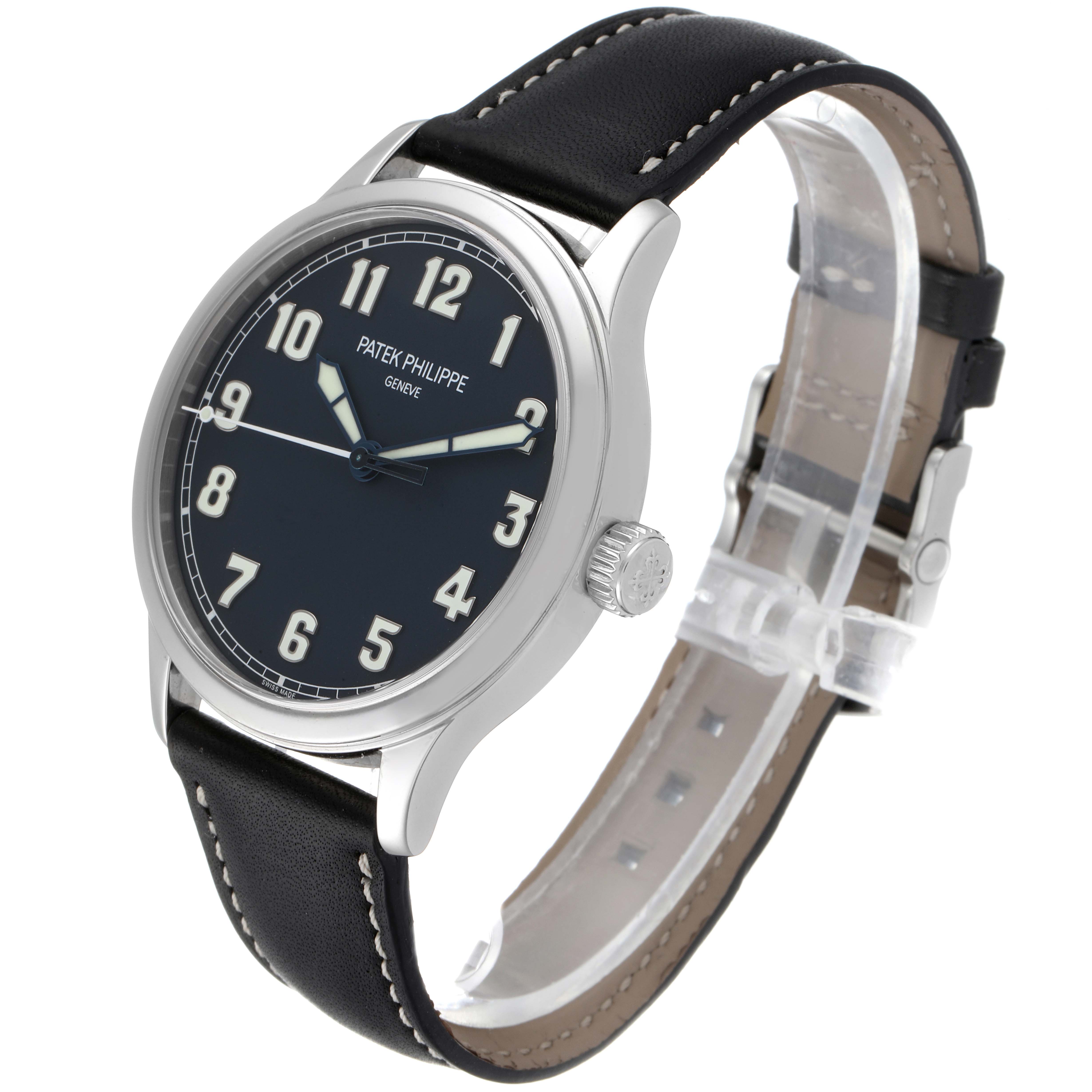 This image shows a Patek Philippe Calatrava 5522A - 001 Men's Stainless Steel Blue Dial 5522A - 001 Men's Stainless Steel Blue Dial watch at a slight angle, displaying the face, crown, case, and leather strap.