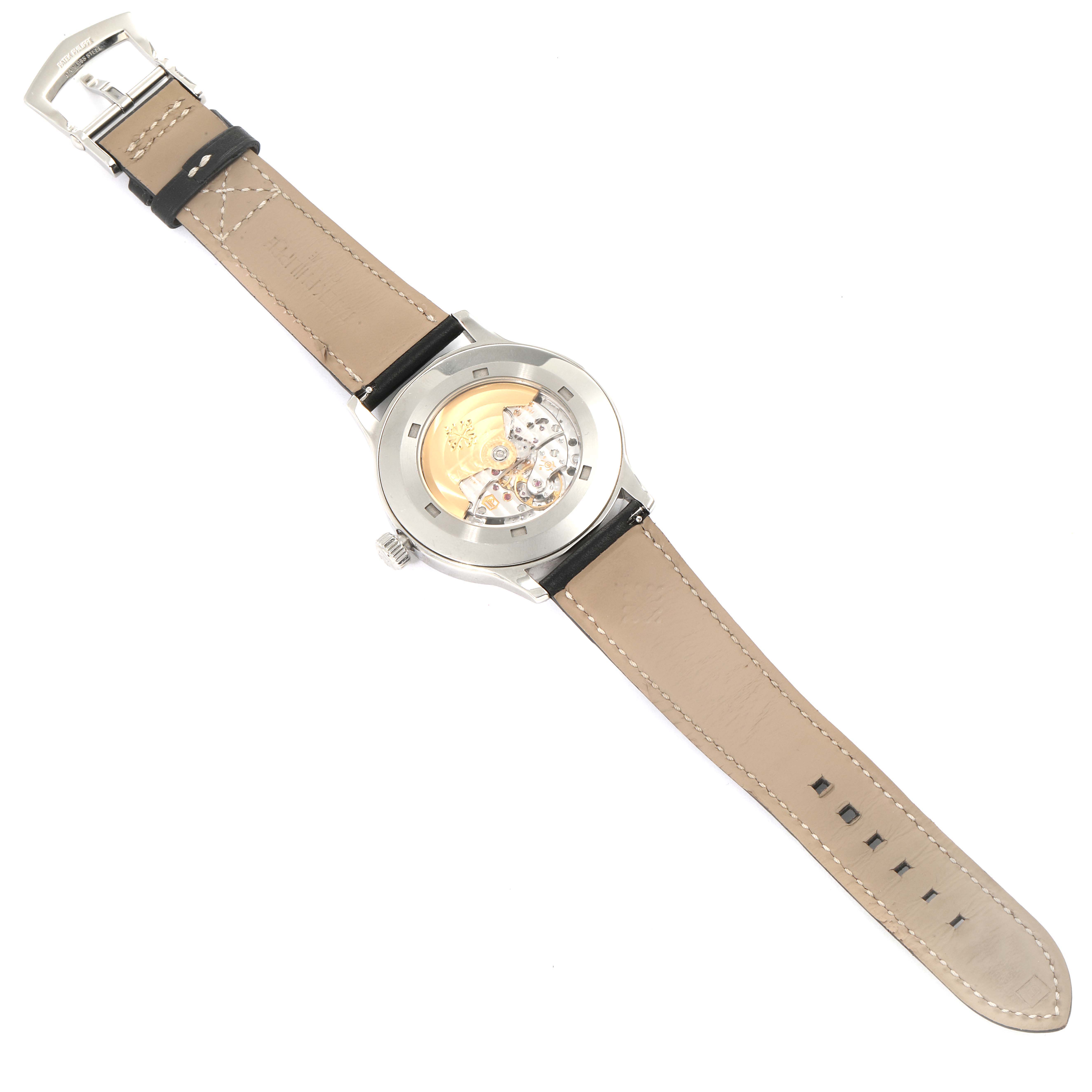 The image shows a Patek Philippe Calatrava 5522A - 001 Men's Stainless Steel Blue Dial 5522A - 001 Men's Stainless Steel Blue Dial watch from the back, displaying the movement and leather straps.