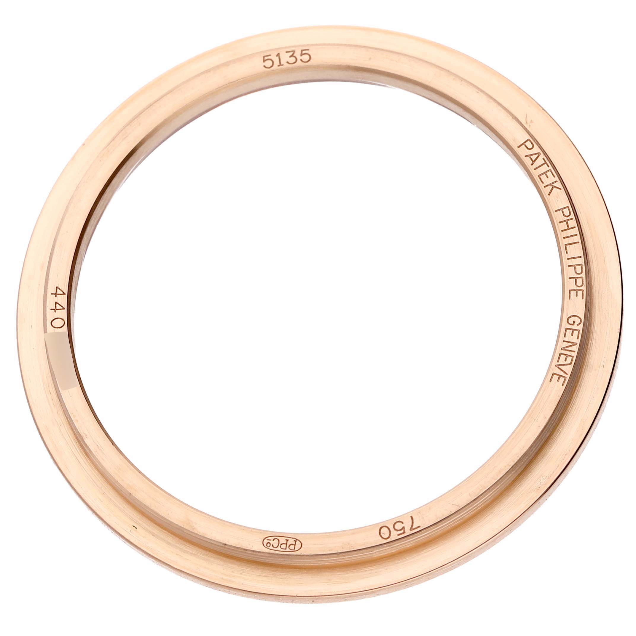 The image shows a gold bezel for the Gondolo model by Patek Philippe, viewed from above, featuring engraved details.