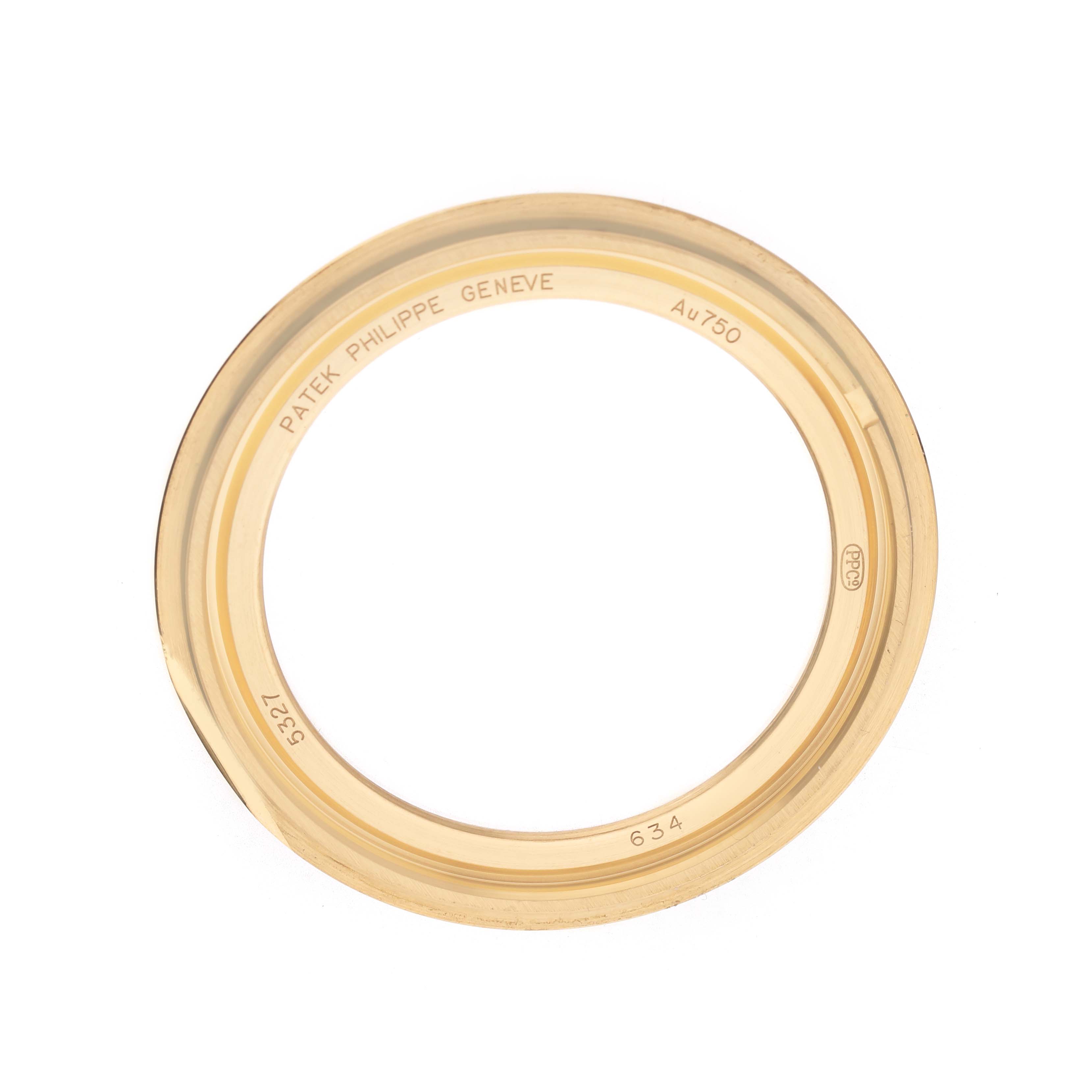 The image shows a bezel for the Patek Philippe Complications 5327J-001 Men's Yellow Gold Beige Dial watch, viewed from the side.