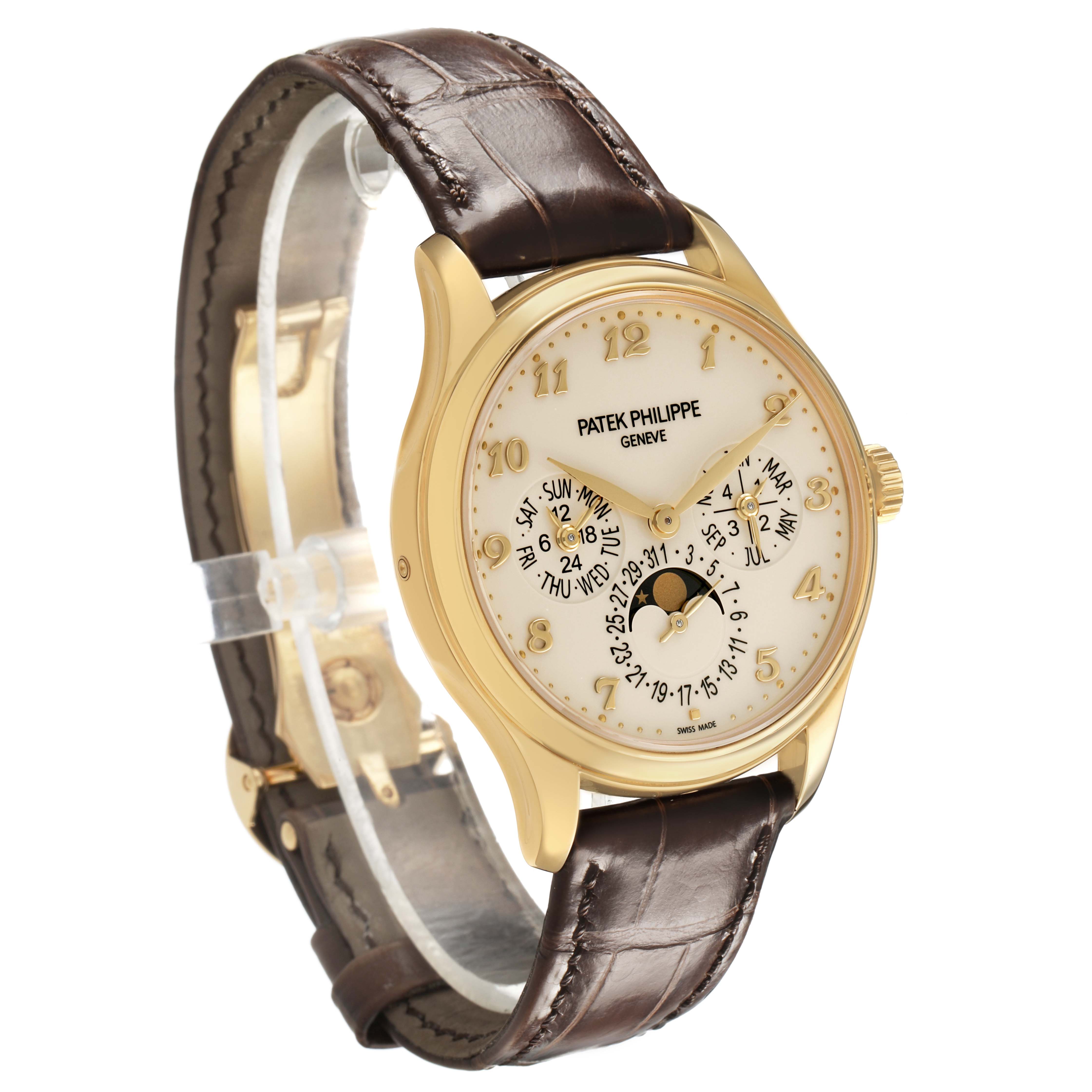 The Patek Philippe Complications 5327J-001 Men's Yellow Gold Beige Dial watch is shown at a three-quarter angle, displaying the face, bezel, crown, and leather strap.