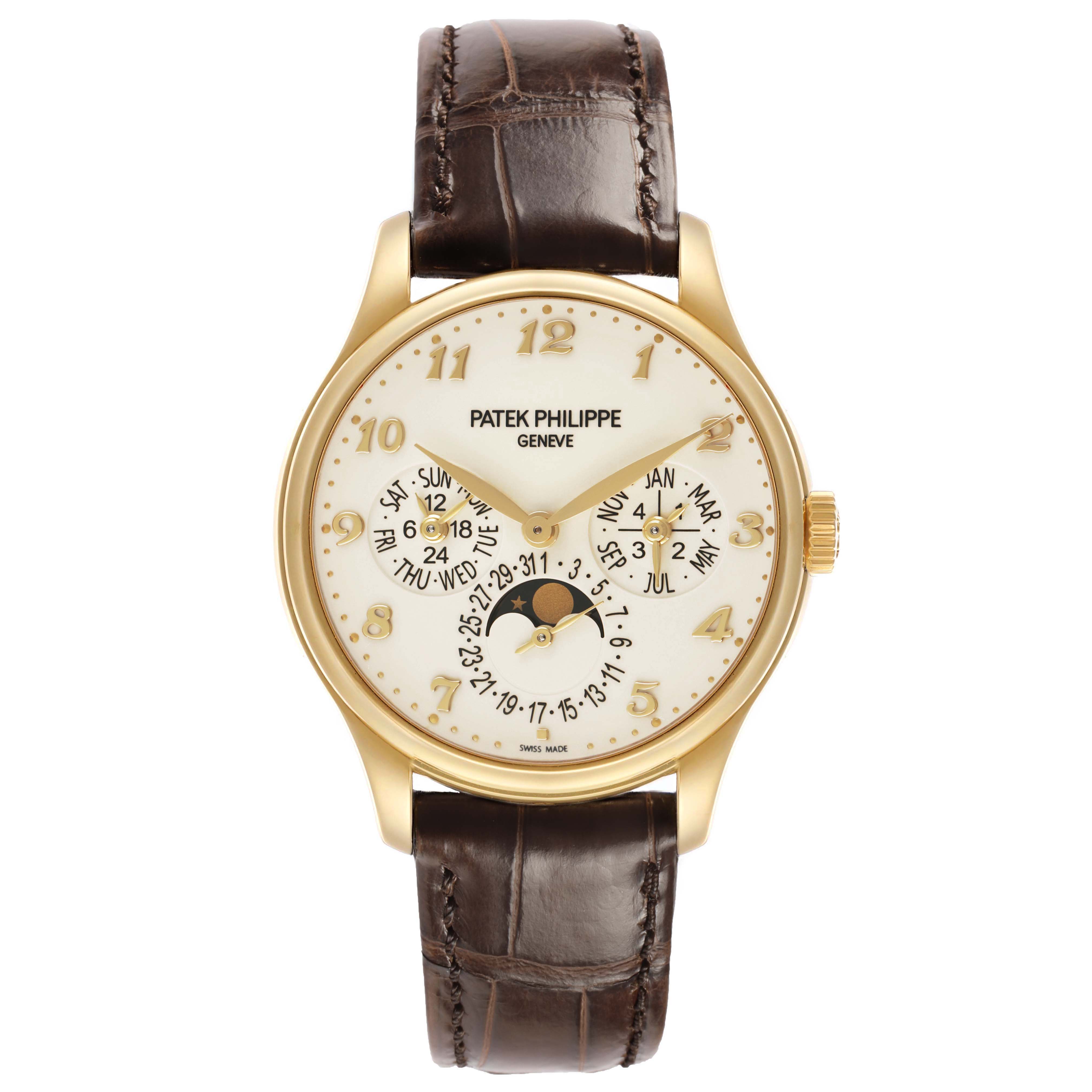 The Patek Philippe Complications 5327J-001 Men's Yellow Gold Beige Dial watch is shown from a front angle, highlighting its gold case, dial with calendar features, and leather strap.